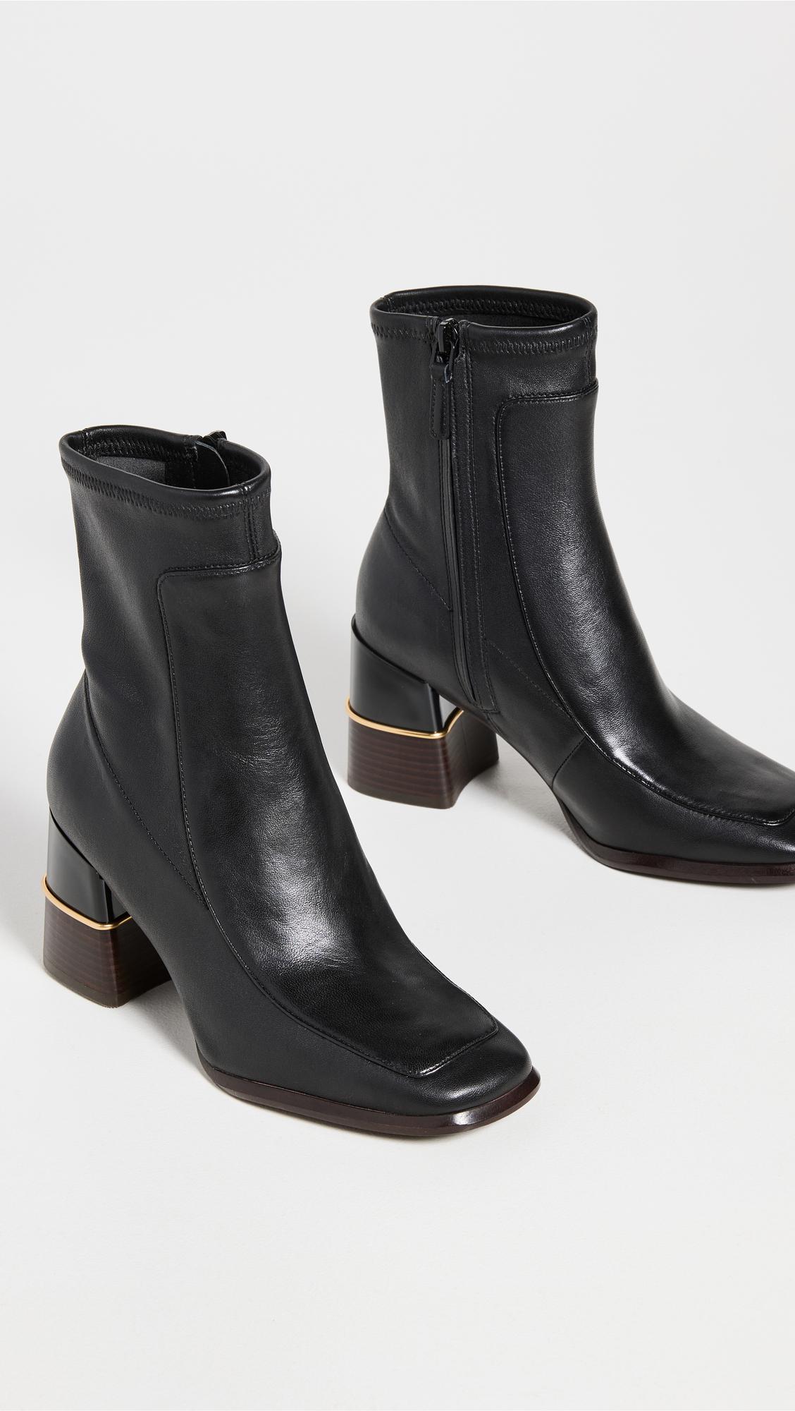 Tory Burch Multi Logo Stretch Boot in Black | Lyst