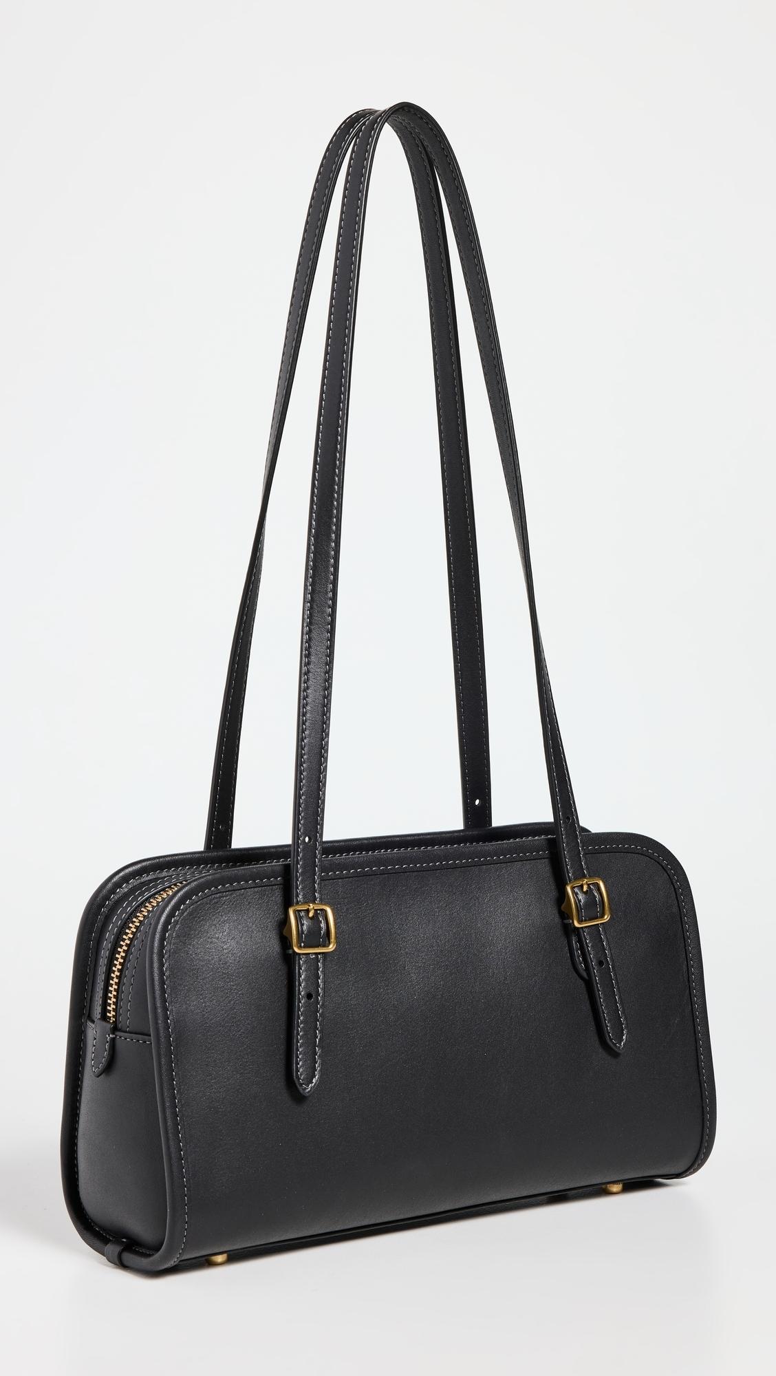 COACH Swing Zip Bag in Black | Lyst