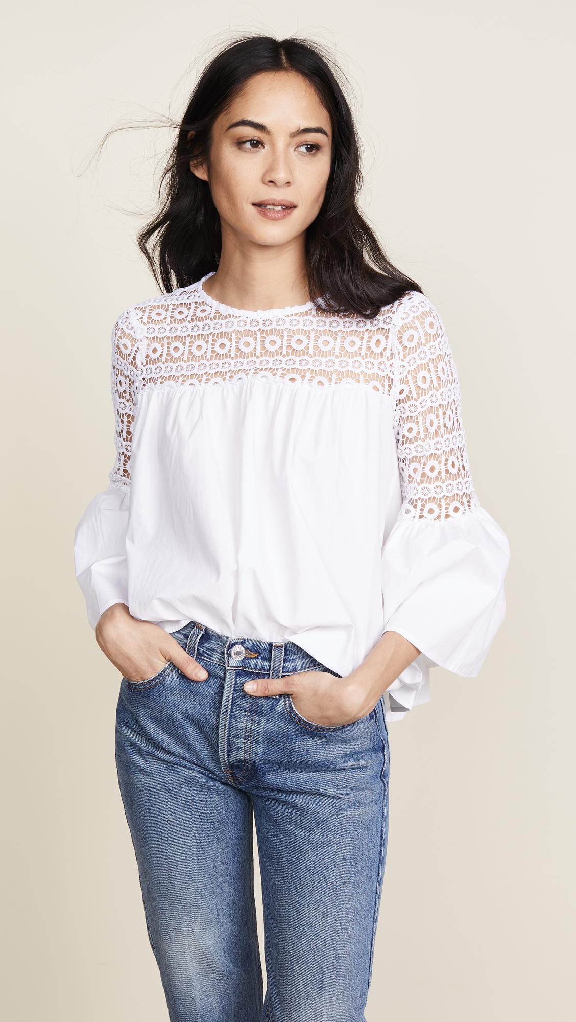 white blouse with roses