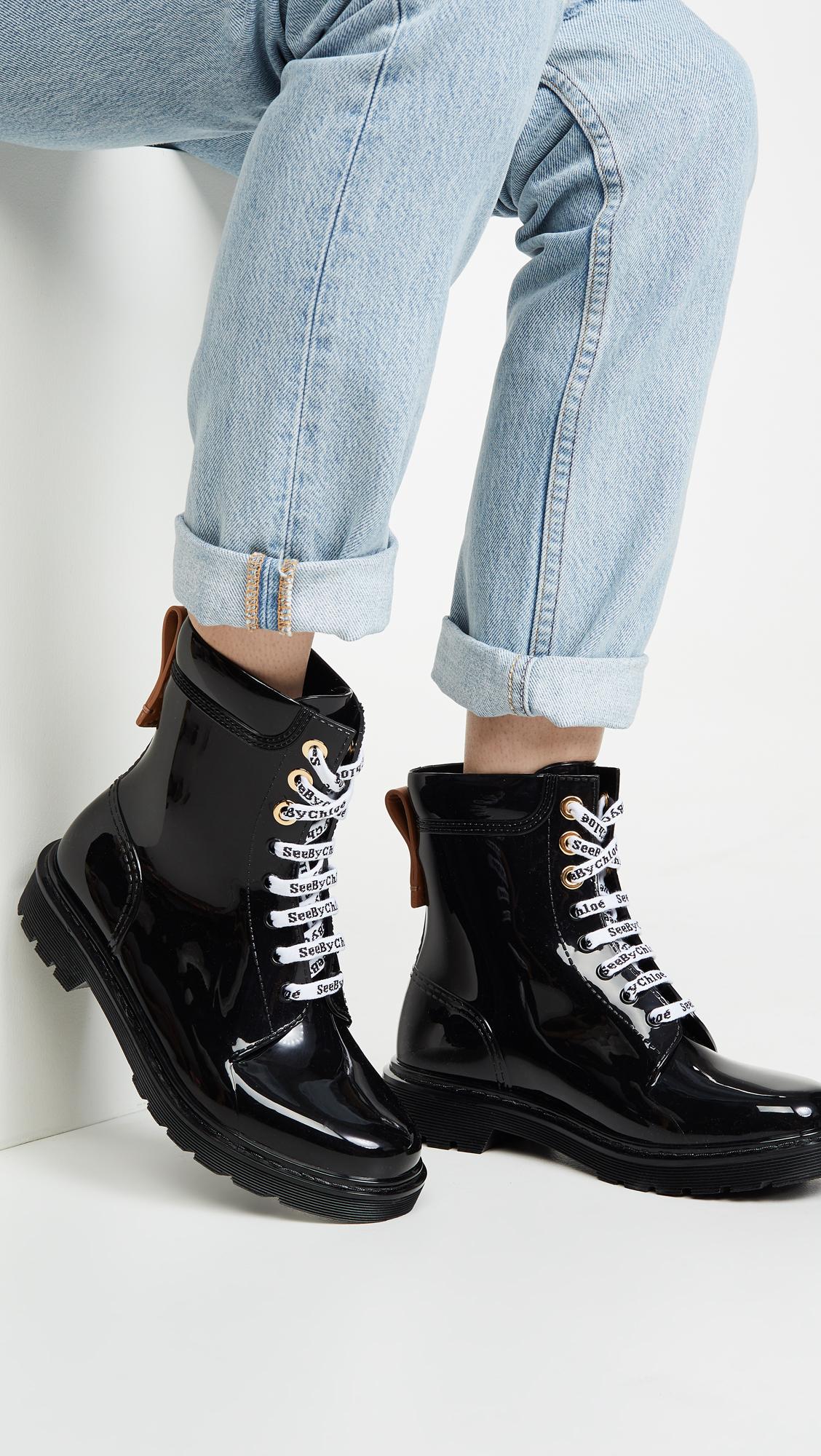 black lace up rain boots