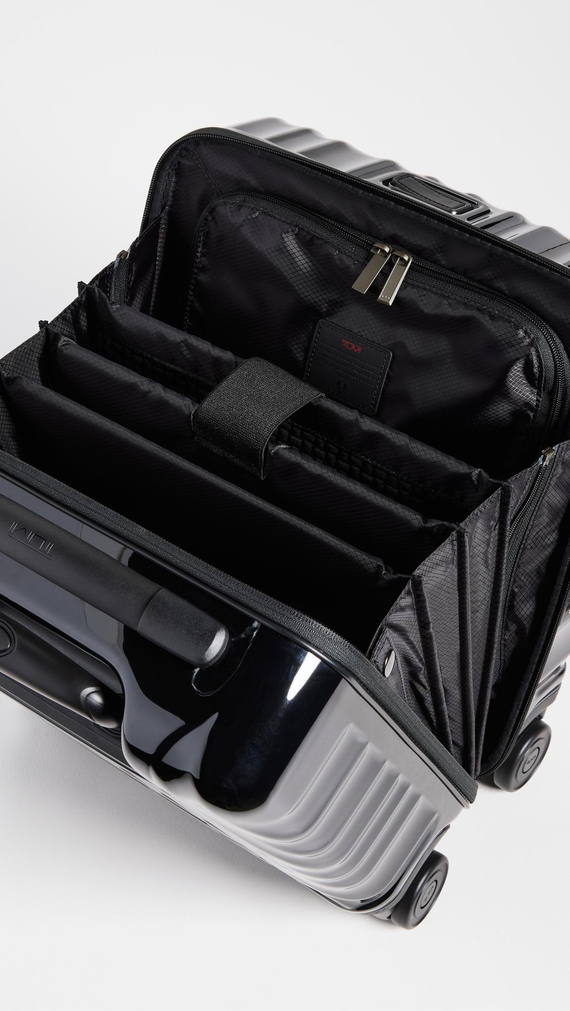 tumi small compact 4 wheeled brief