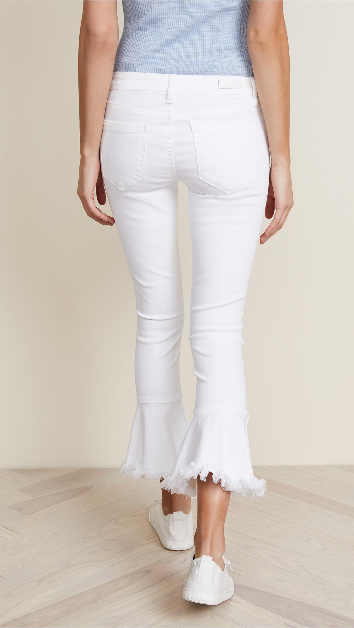 white ankle flare jeans