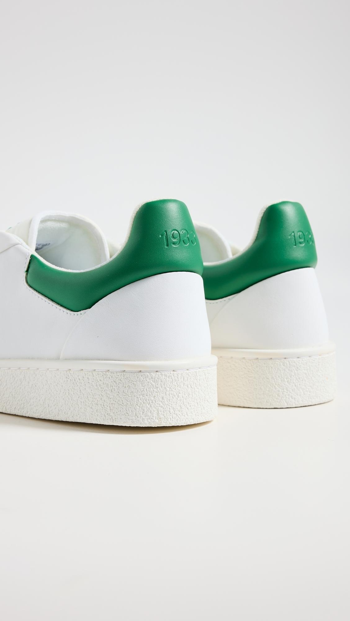 lacoste-WHTGRN-Baseshot-Prm-