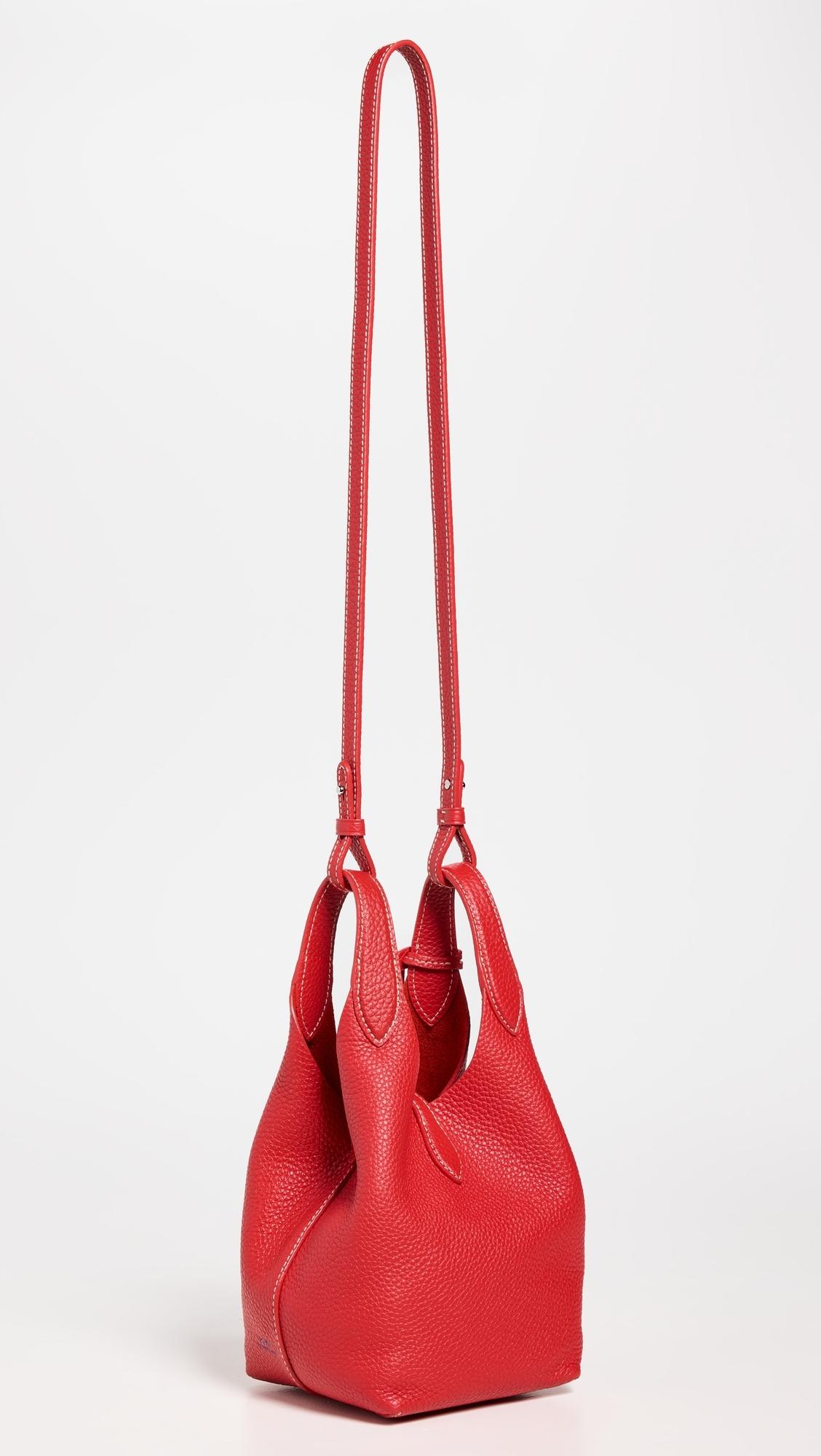 Polo Ralph Lauren Shiny Drum Pebble Crossbody Bag in Red | Lyst