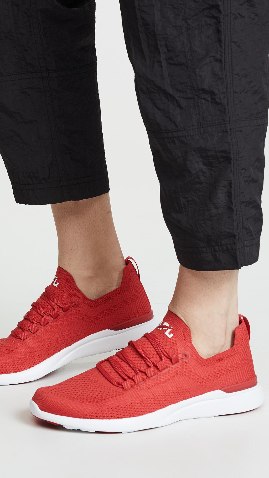 apl red sneakers