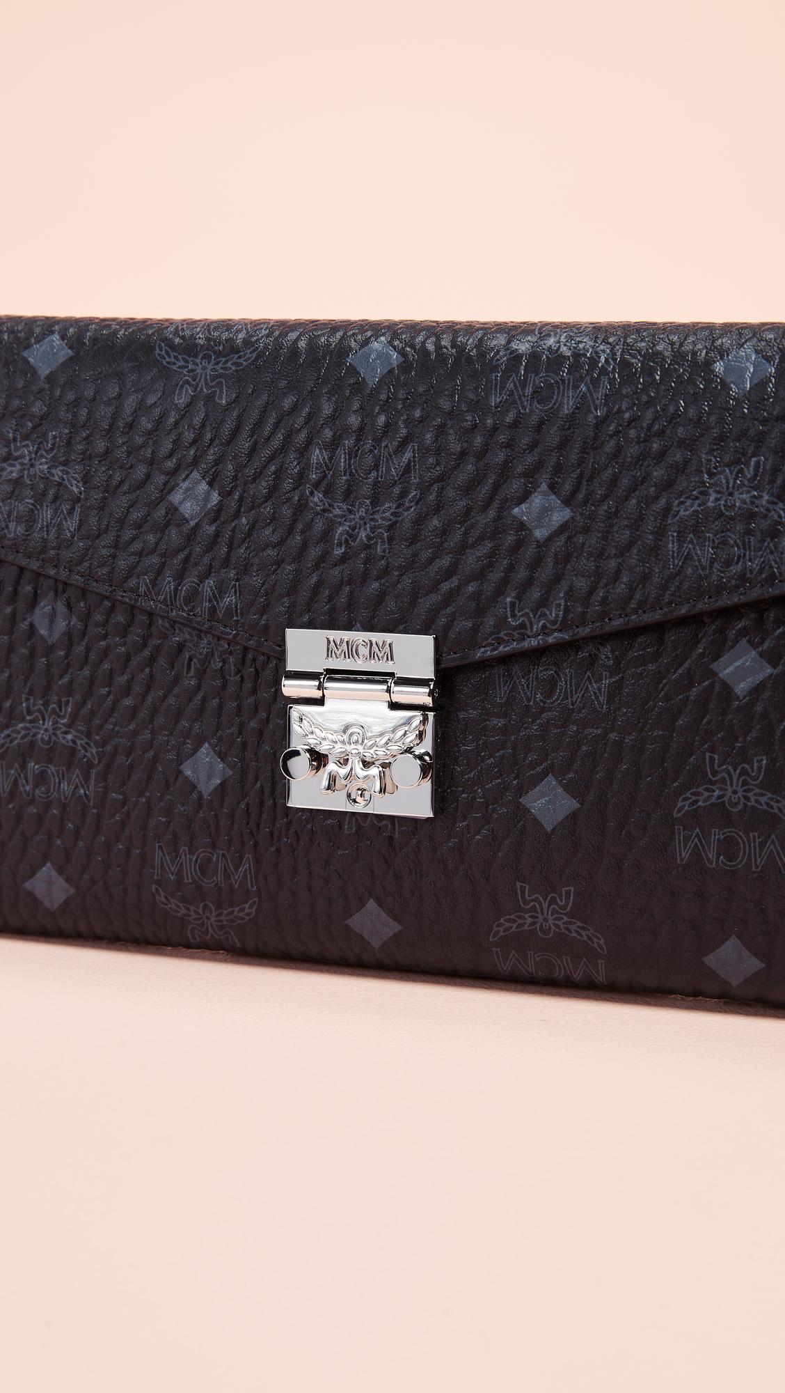 Patricia continental crossbody wallet in visetos top