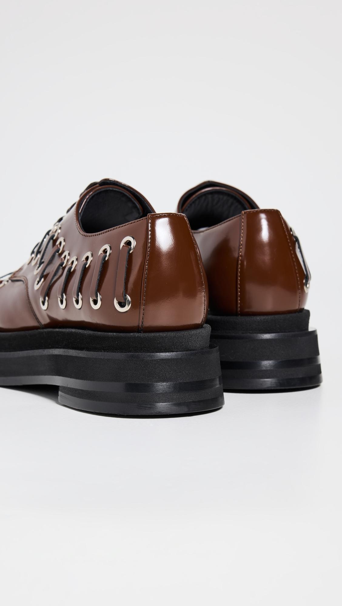 【Simone Rocha】Heart Toe プラットフォームグロメットブローグ Heart Toe leather platform brogues in black - Simone Rocha
