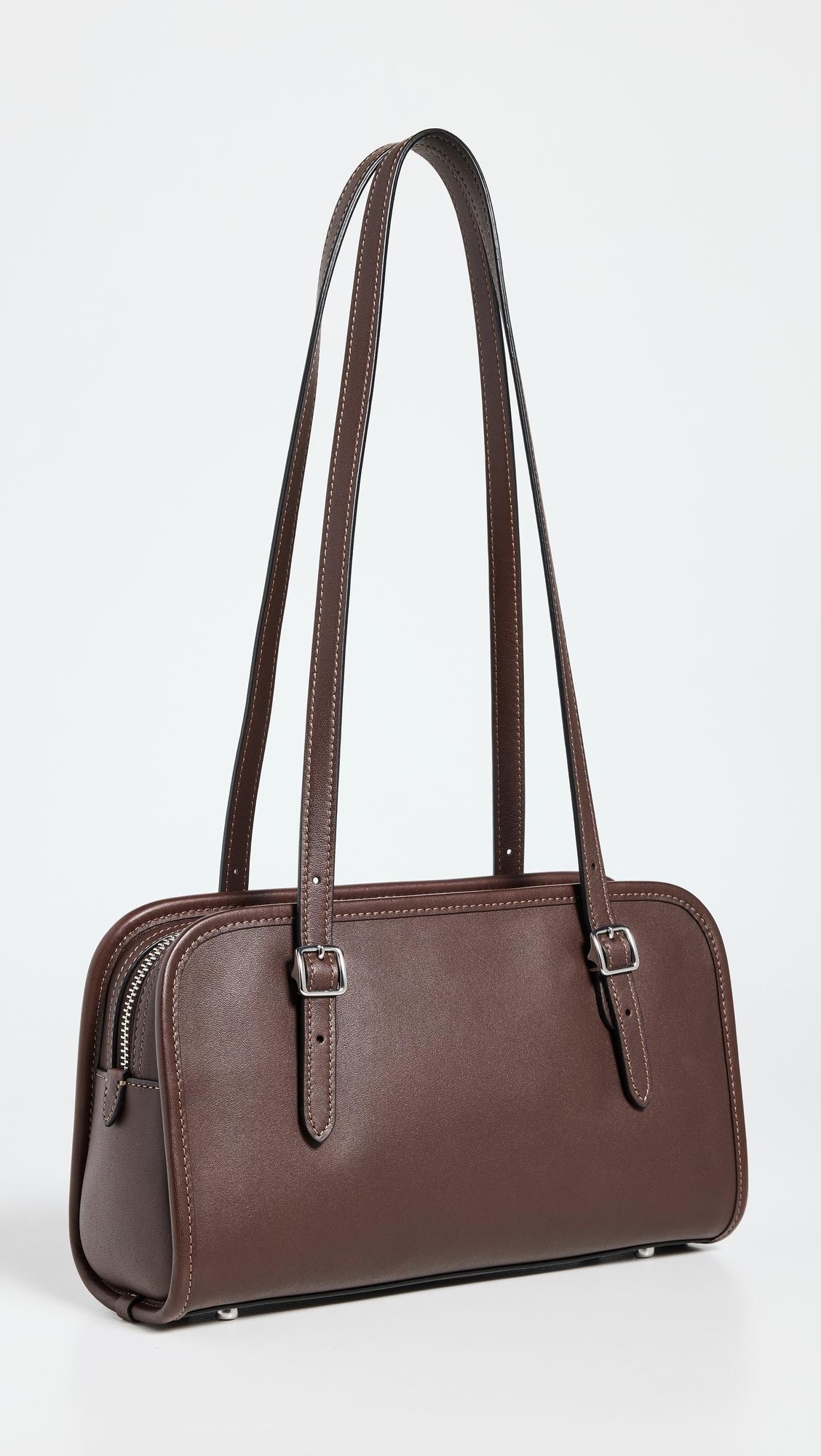 COACH Swing Zip Bag in Brown | Lyst