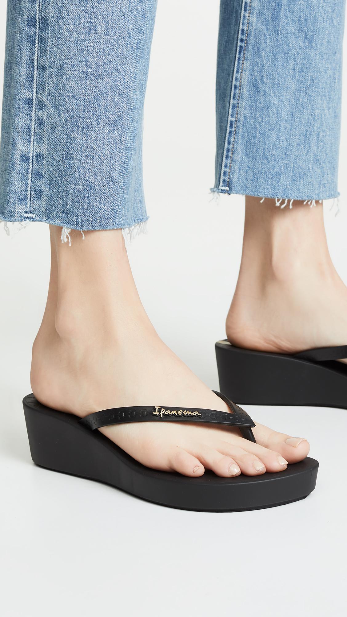 black wedge flip flops uk