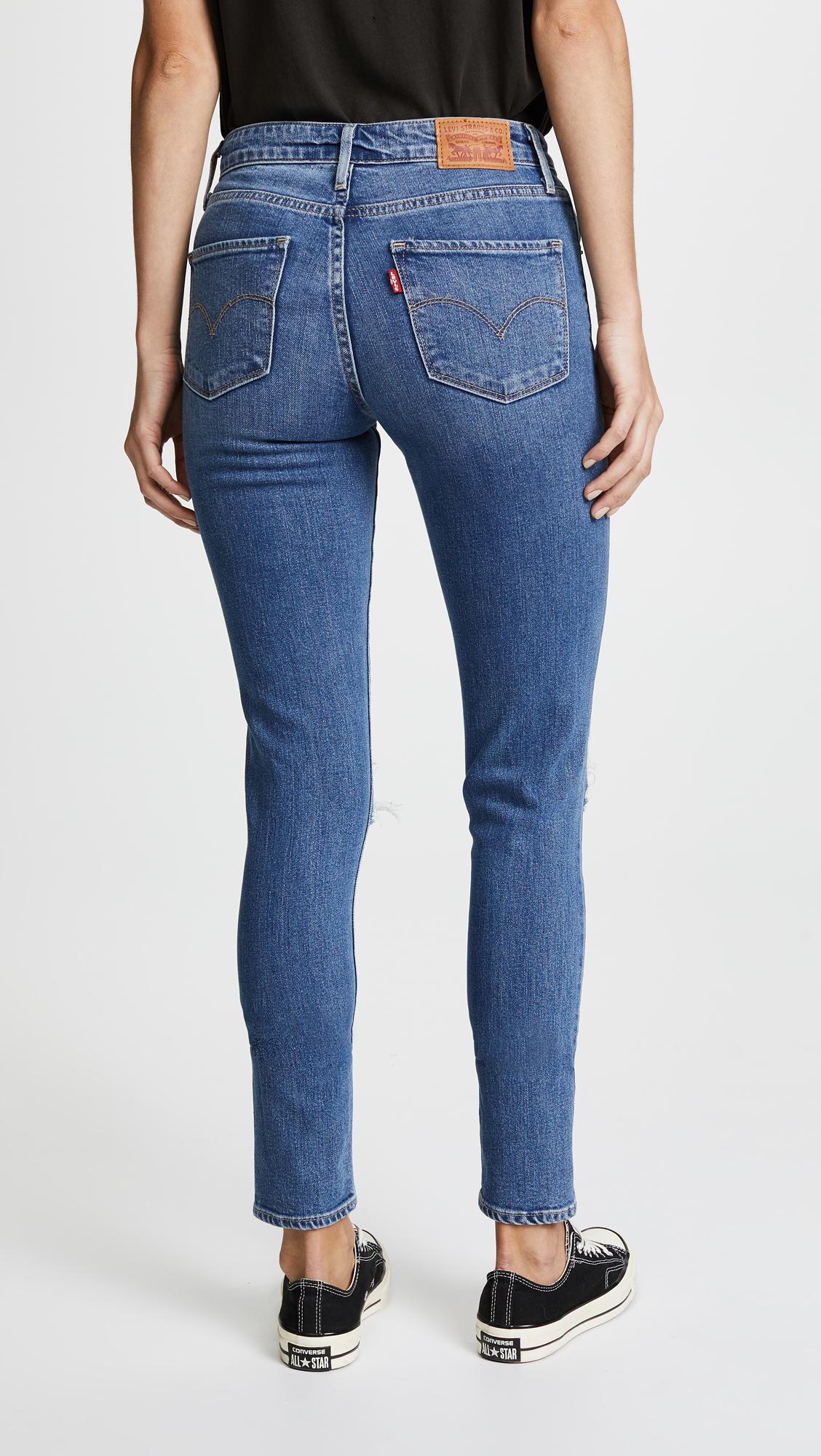 Levi's 721 High Rise Distressed Skinny Jeans in Blue - Lyst
