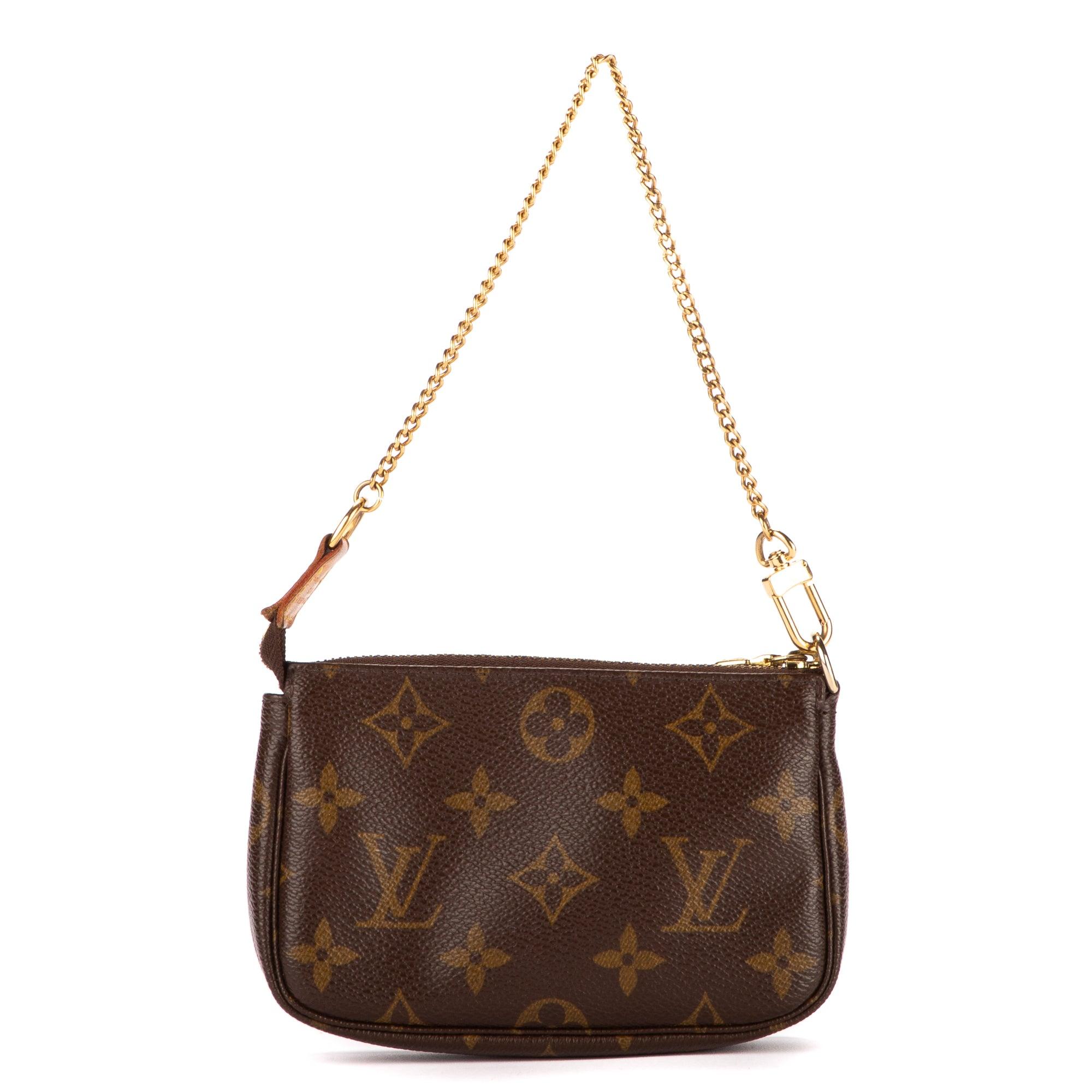 Louis Vuitton Fuchsia Monogram Perforated Pochette Accessories Bag