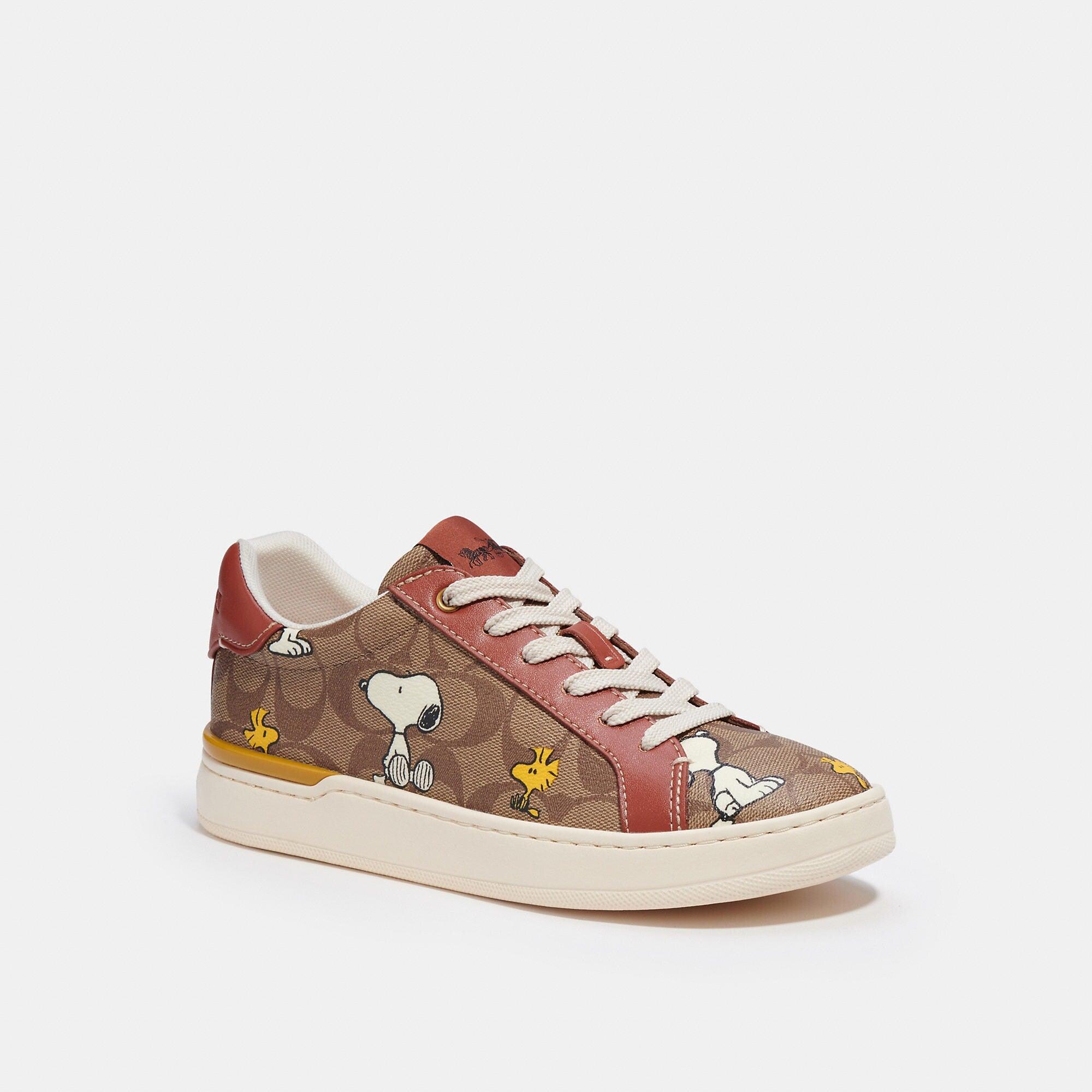 Coach Outlet Coach X Peanuts Clip Low Top Sneaker In Signature Canvas With  Snoopy Woodstock Print in Pink | Lyst