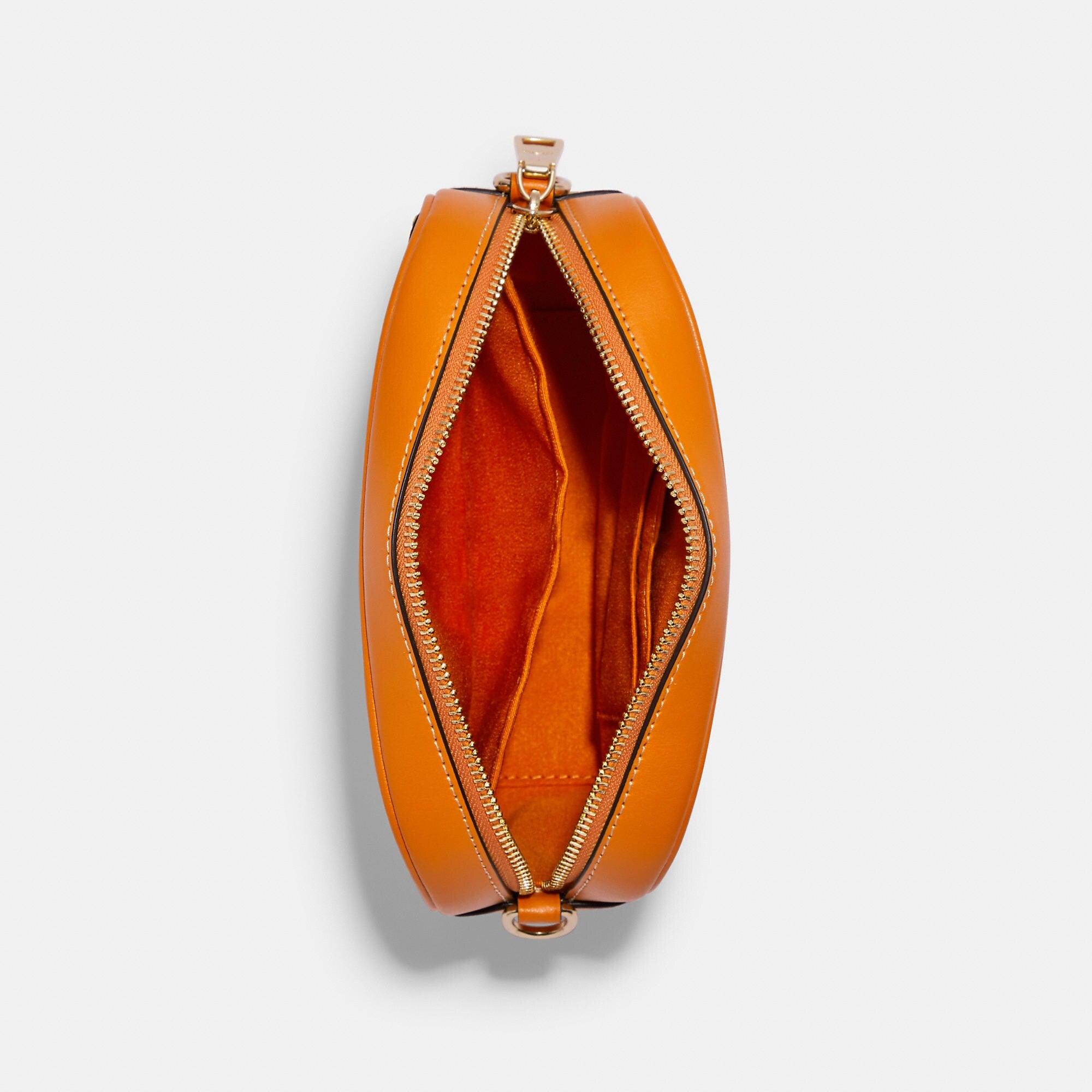 Coach mini camera bag with orange print new arrivals