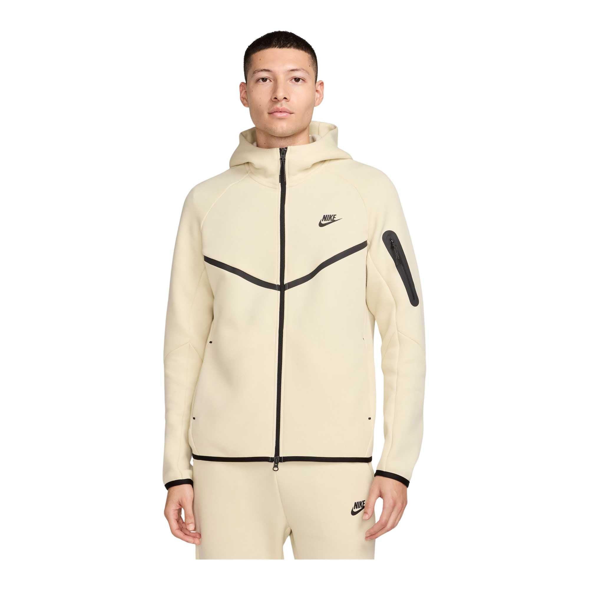 white and brown tech fleece