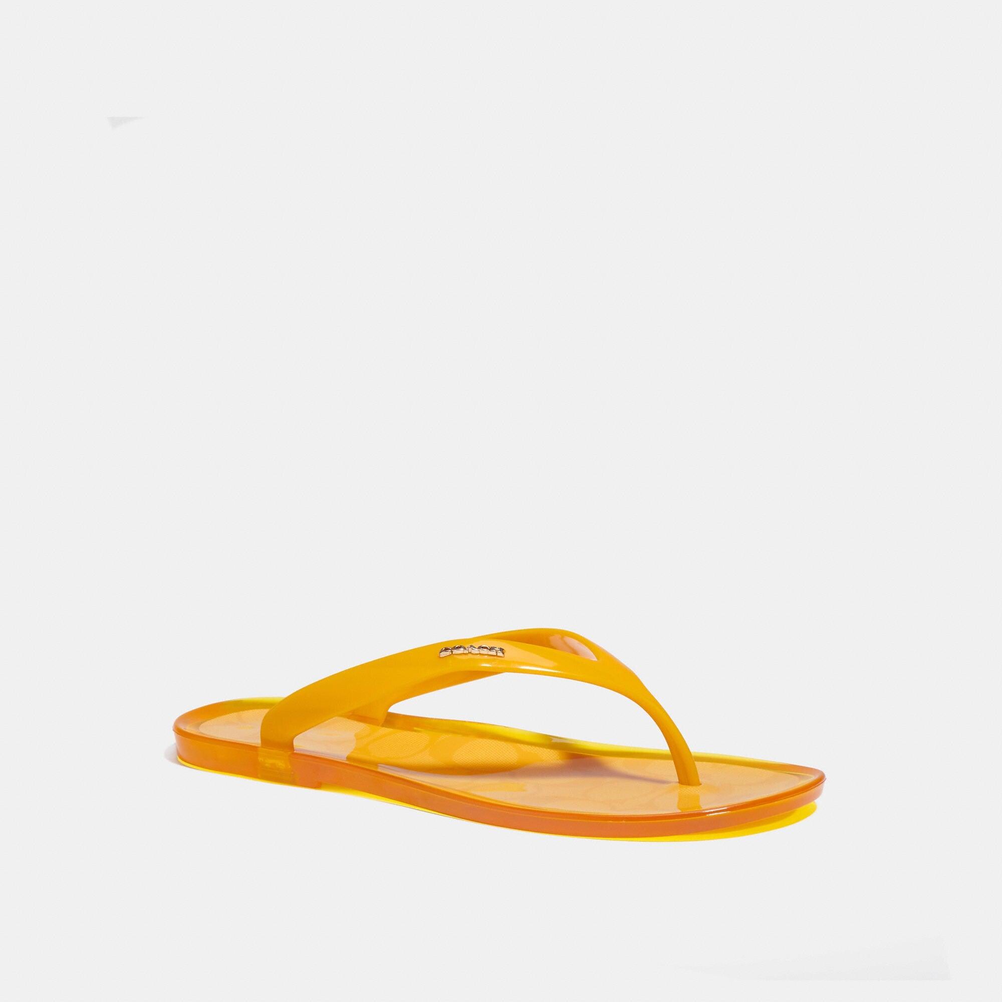 yellow coach flip flops