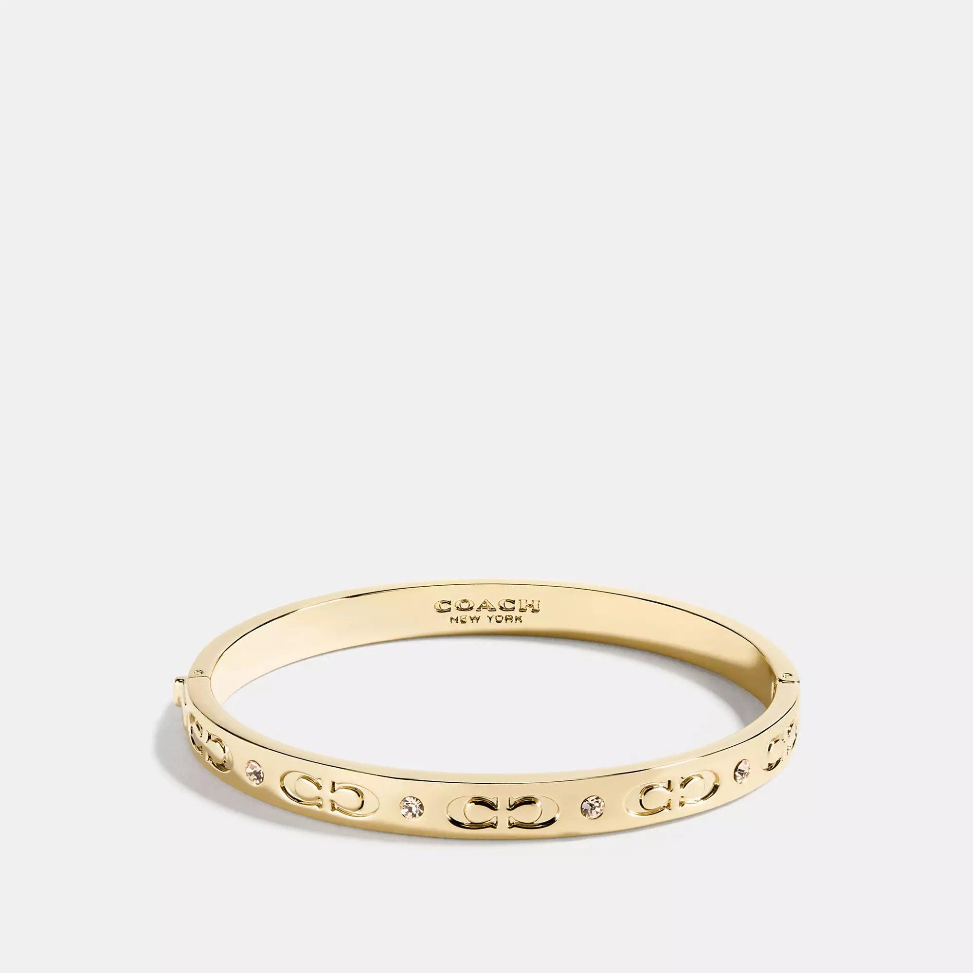 COACH Signature Hinged Bangle in Metallic | Lyst