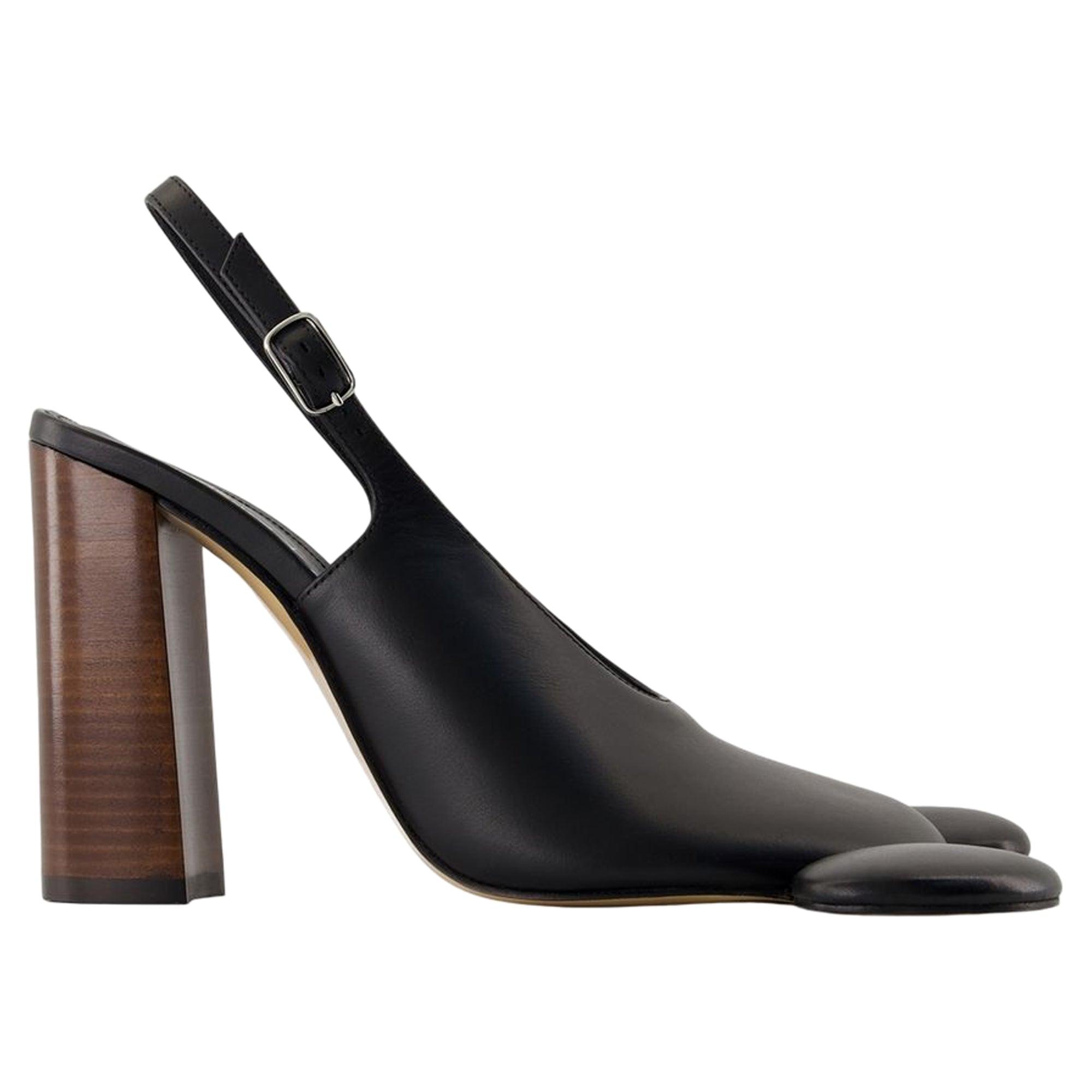 サンダル・ミュール COPERNI Women Sandals DSH77F6041 BLK black Silicone Flower Flat Sandals – Coperni