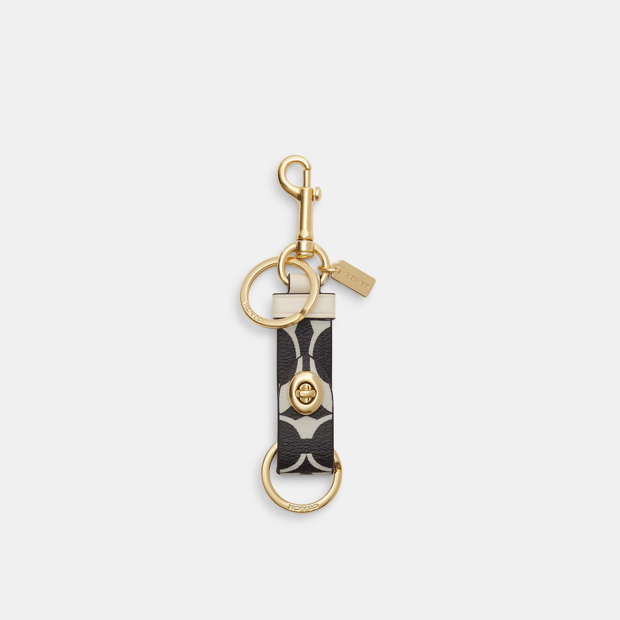 COACH Trigger Snap Bag Charm In Signature Canvas in Metallic Lyst