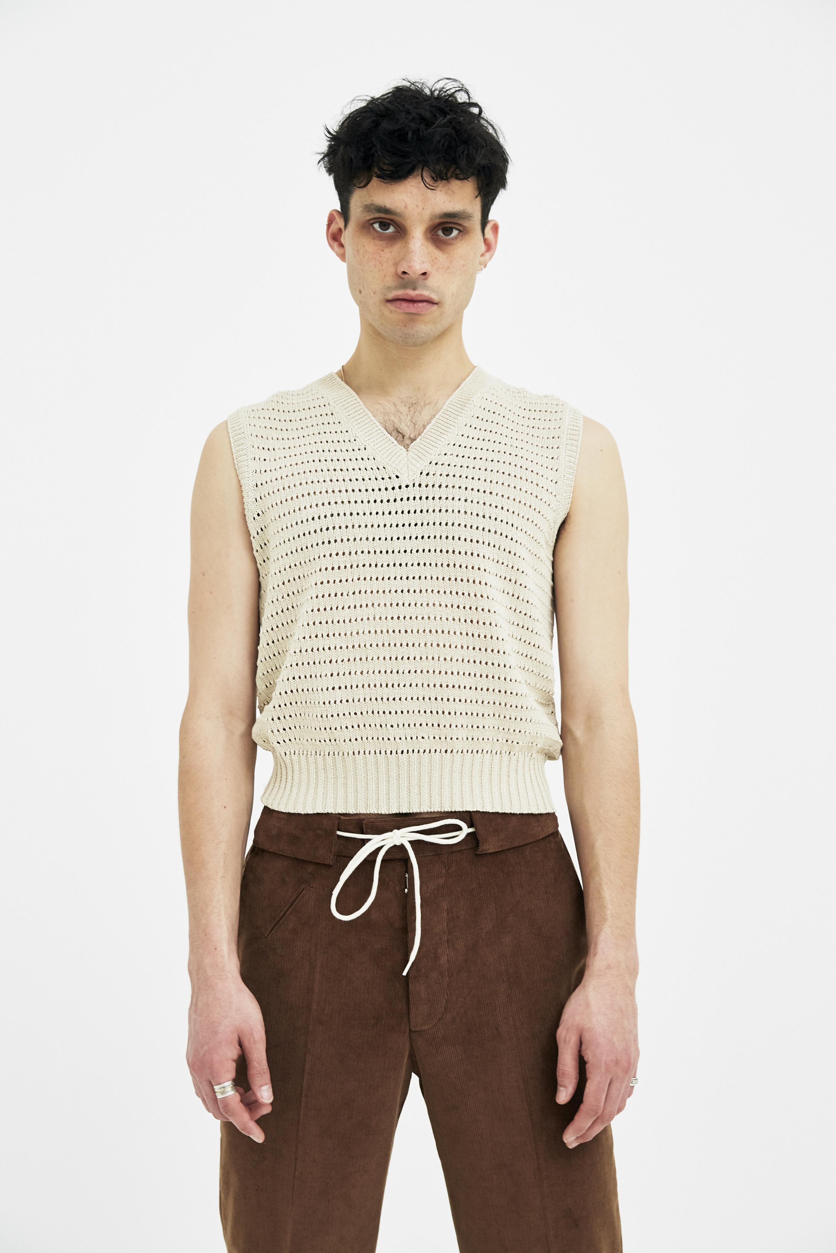 beige sweater vest