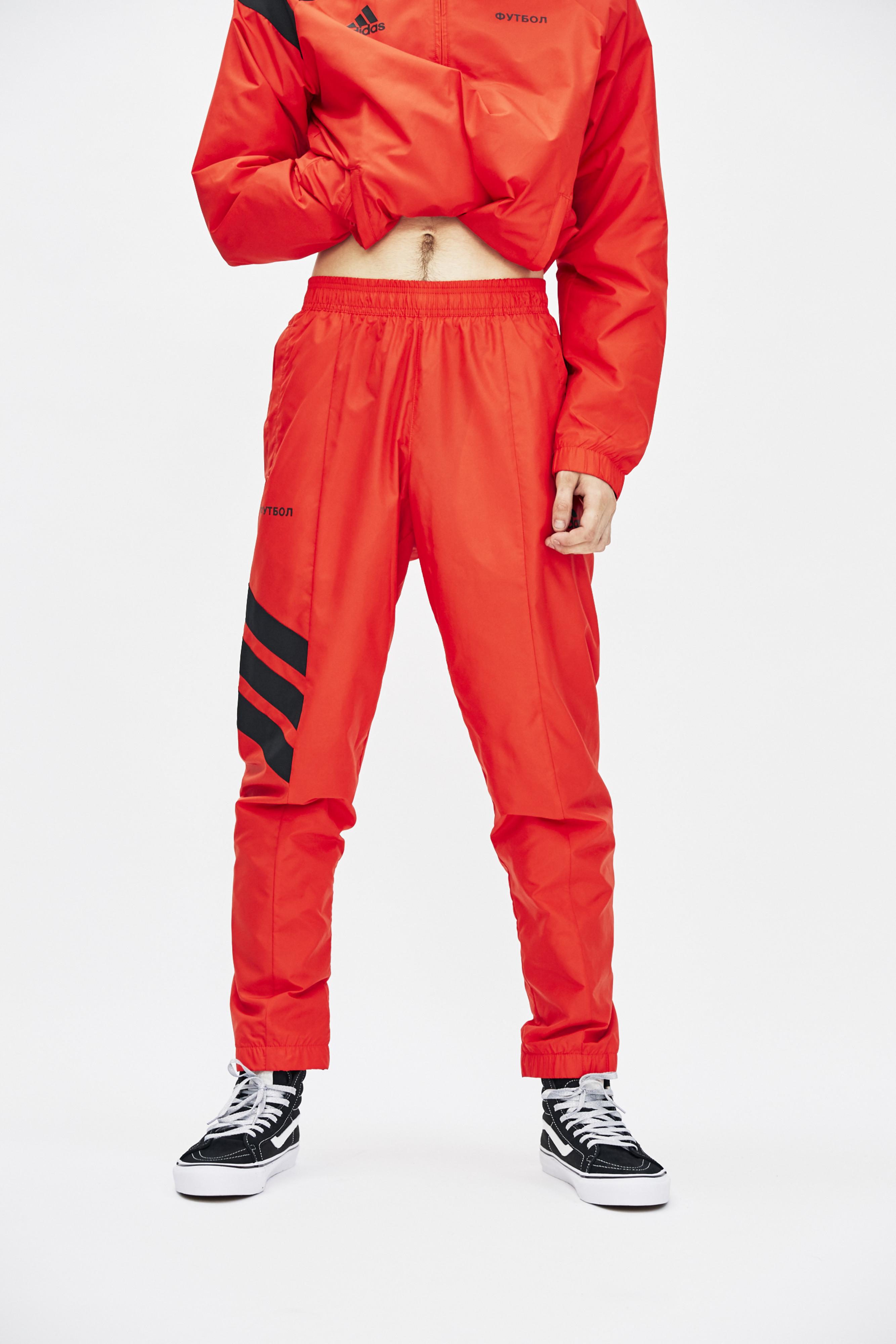 adidas track pants red