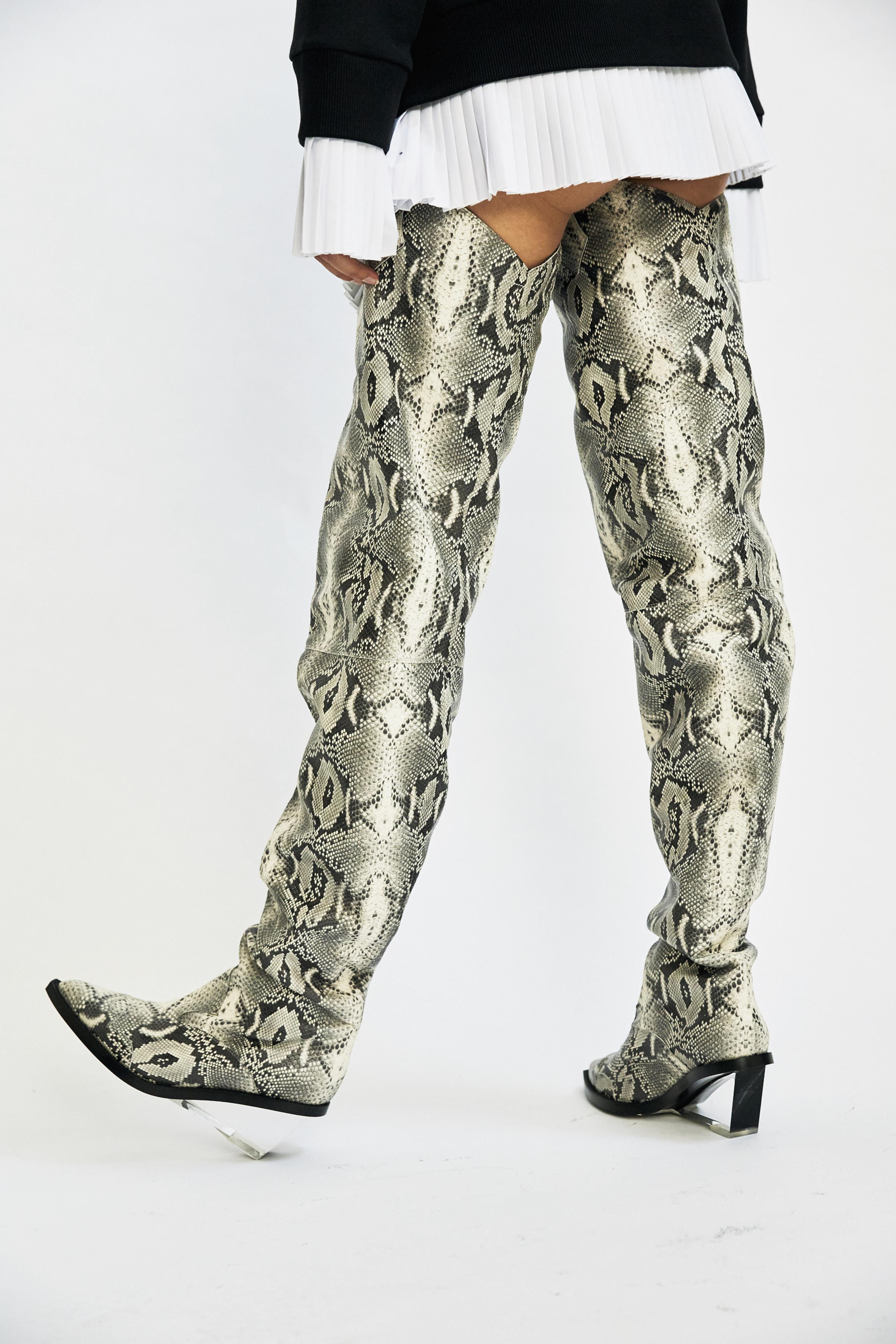 snakeskin thigh high boots