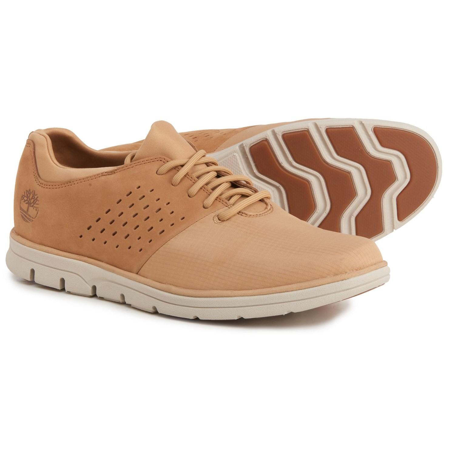 black vinyl knee high boots