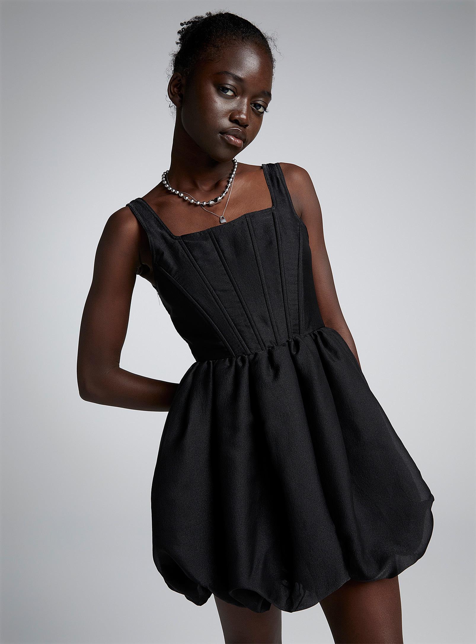 https://cdna.lystit.com/photos/simons/5dbfeb65/storia-Black-Shimmering-Crepe-Bubble-Dress.jpeg