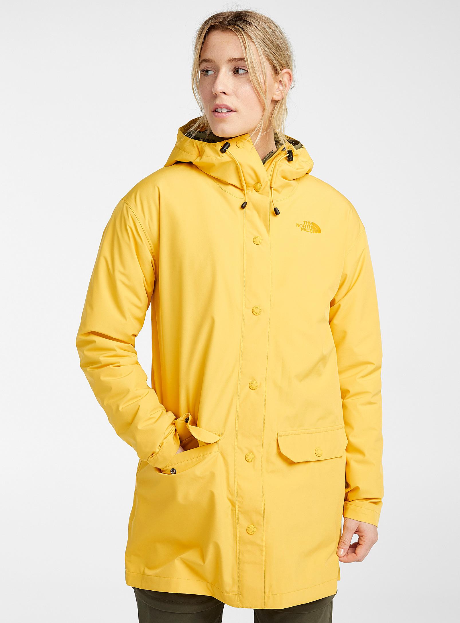bright yellow raincoat