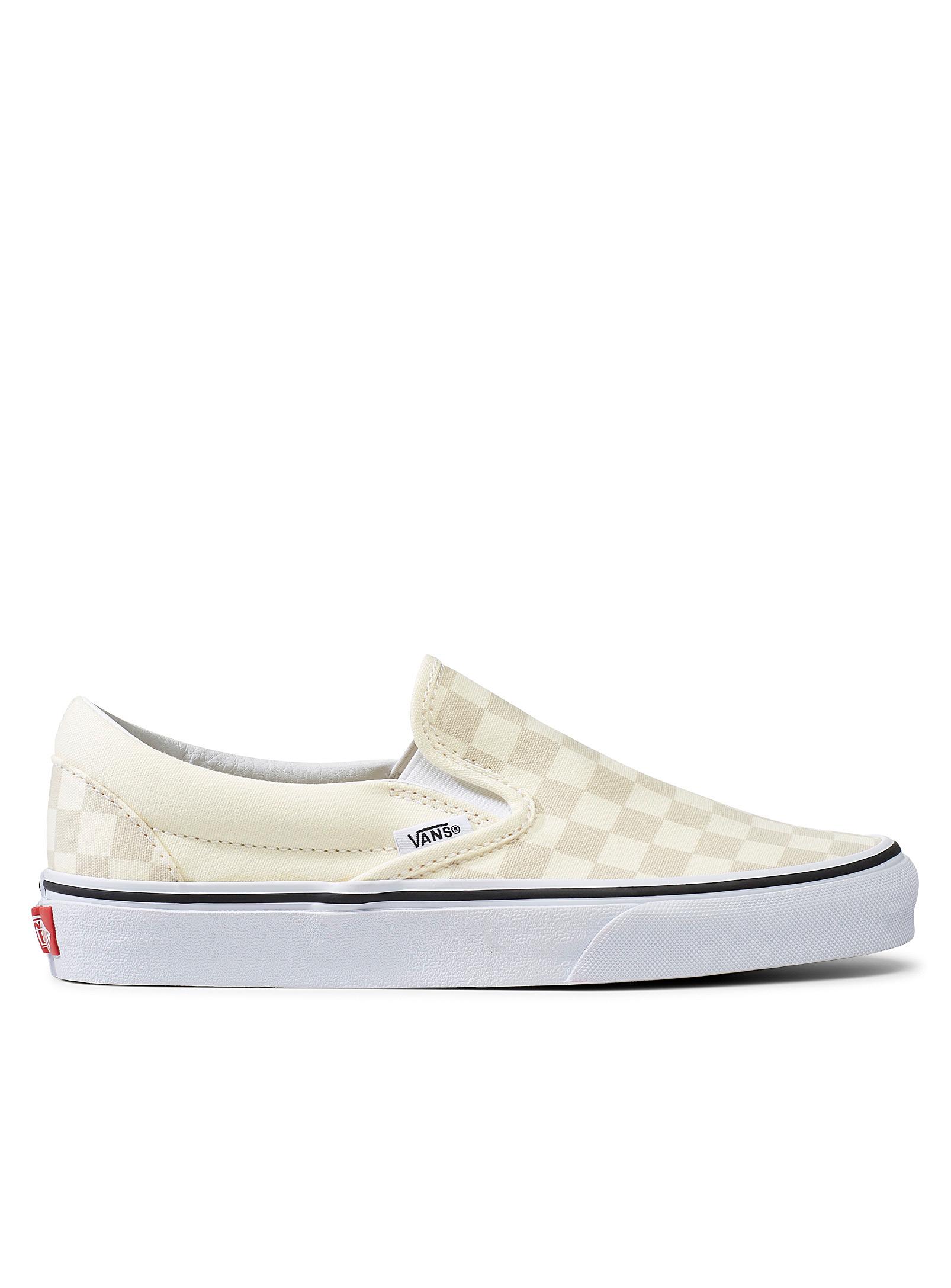 tan and white checkerboard vans