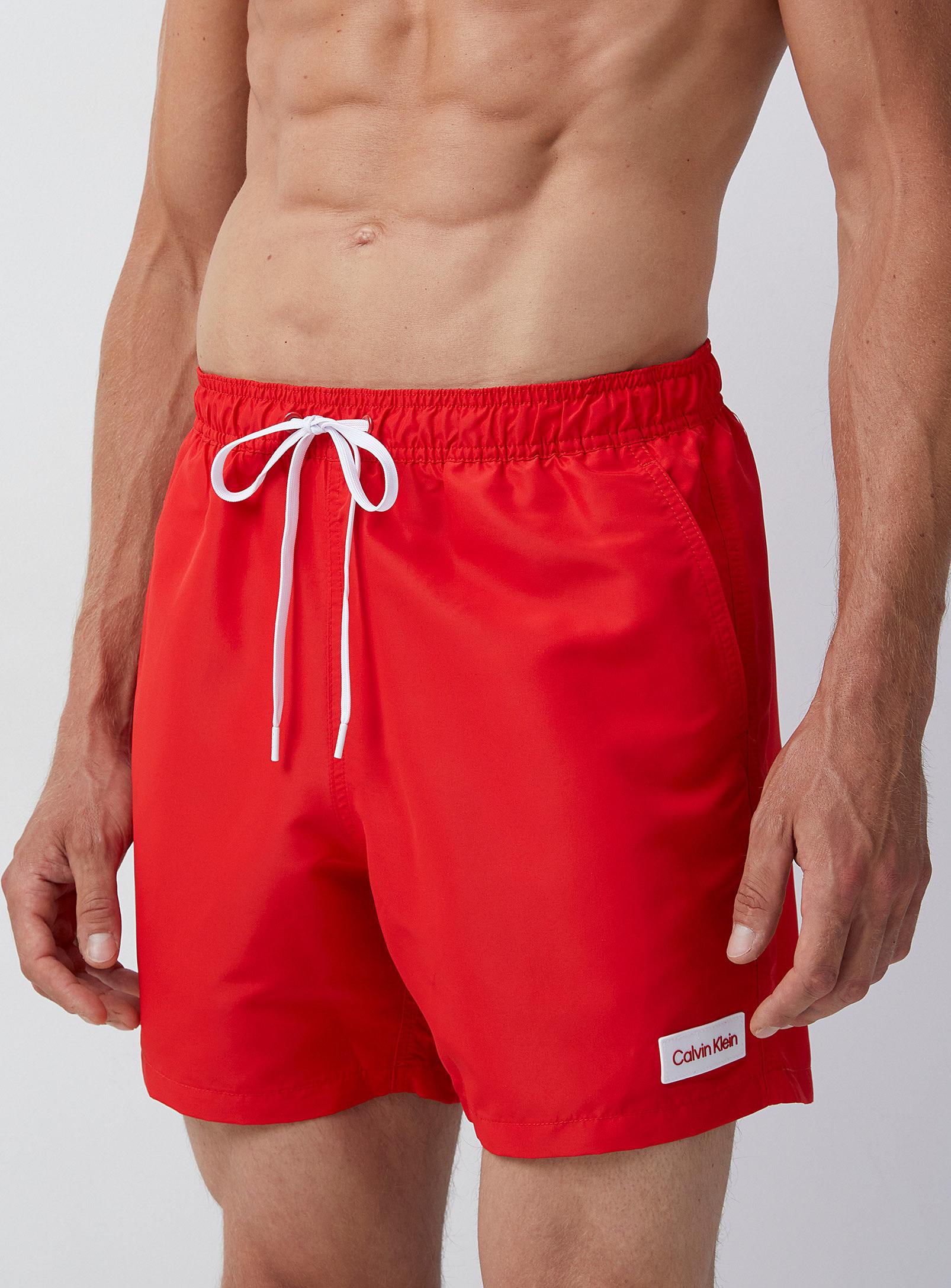 Calvin Klein Logo Badge Solid Swim Trunk in Red for Men | Lyst