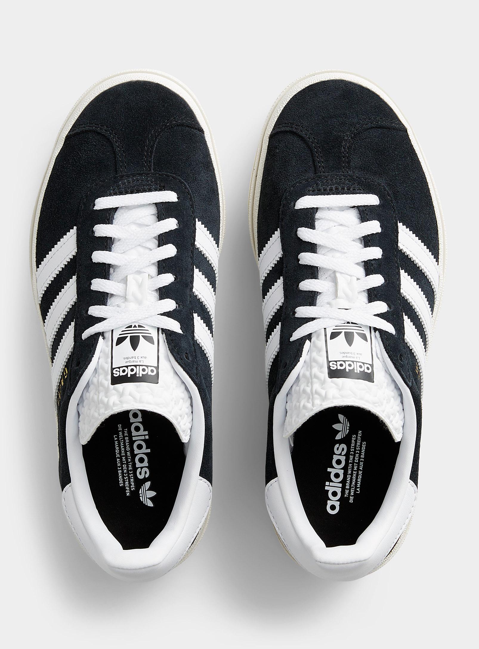 Adidas white trainers shop with black stripes