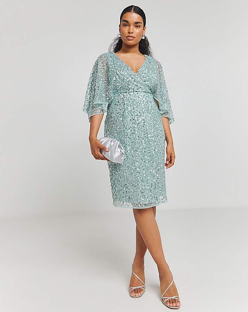 faux wrap midi dress West KEI Knit Short Sleeve - Black making it a perfect choice for any event. Three Quarter Sleeve Faux Wrap