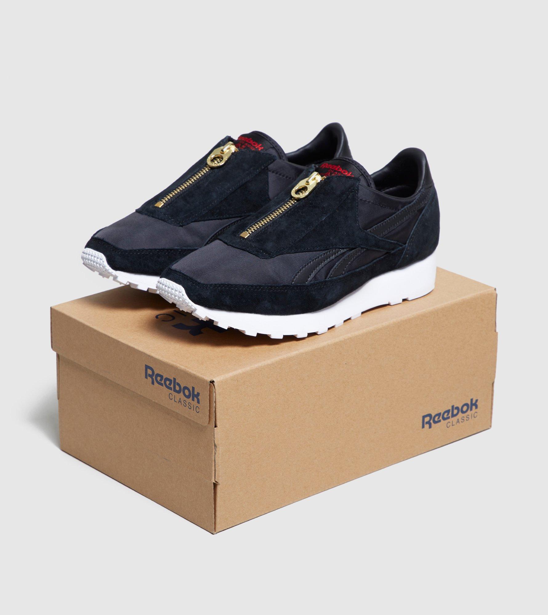 reebok aztec zip