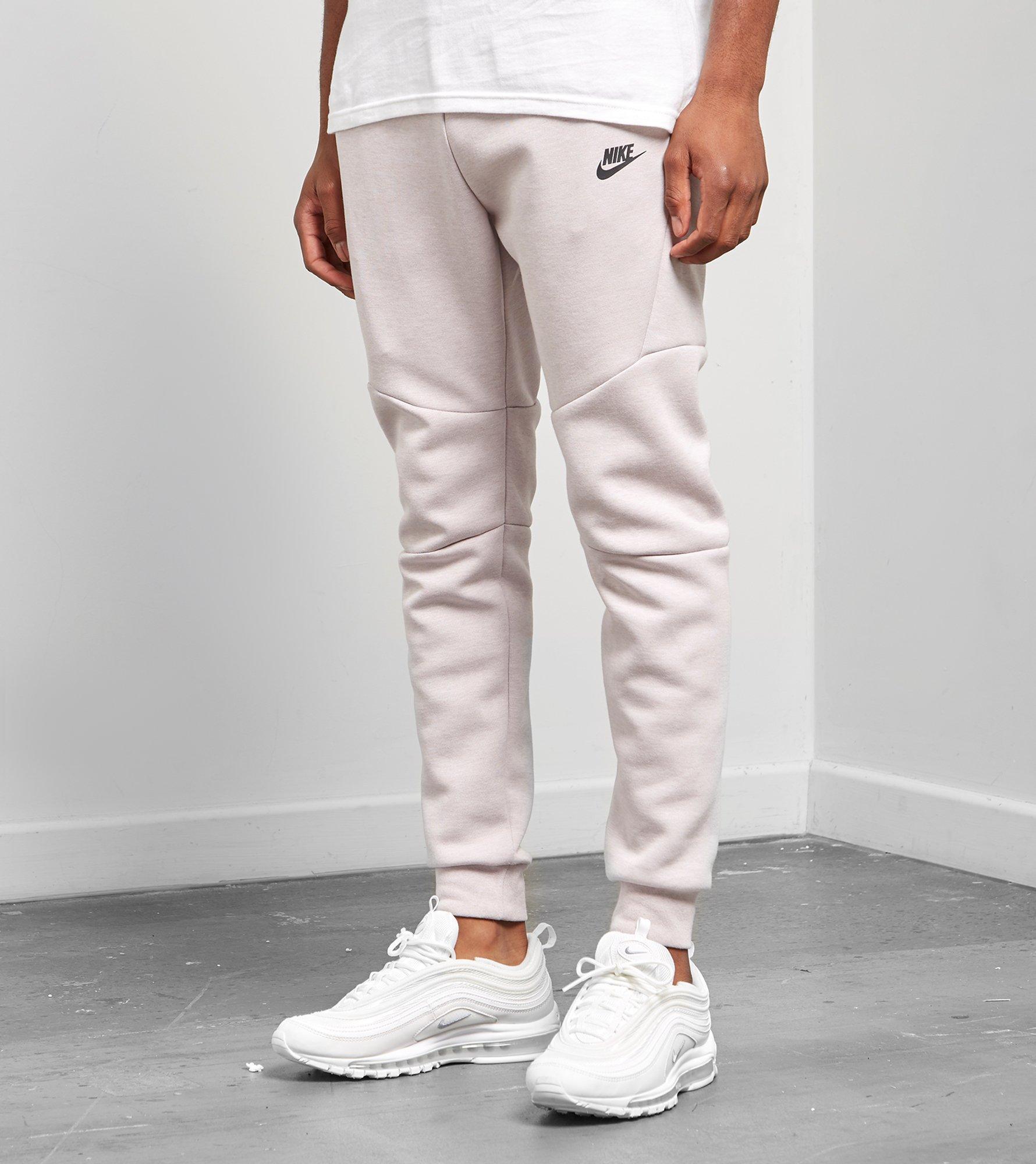 pink nike tech pants