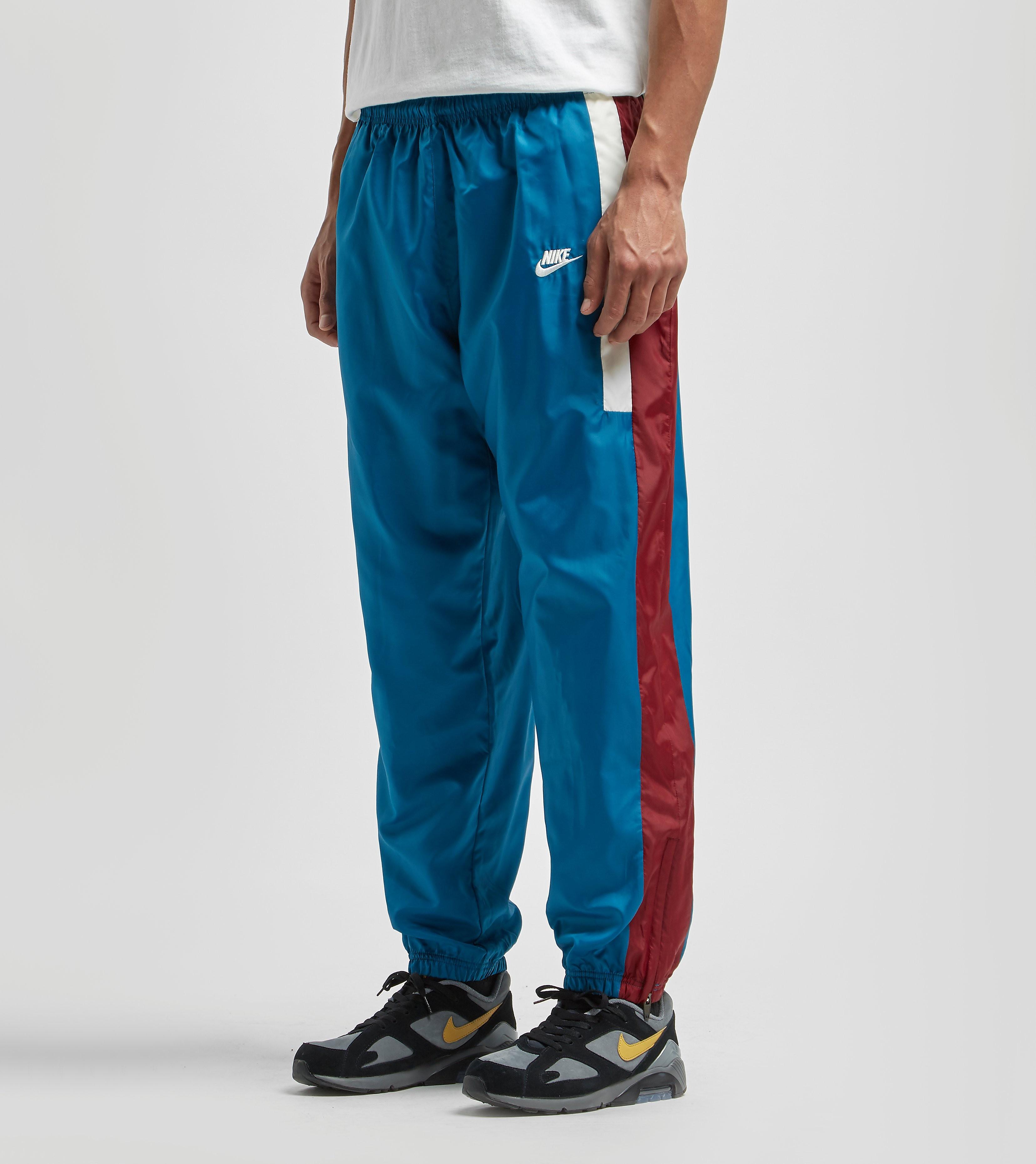 Pantaloni tuta Reissue Woven da Uomo di Nike in Blu | Lyst