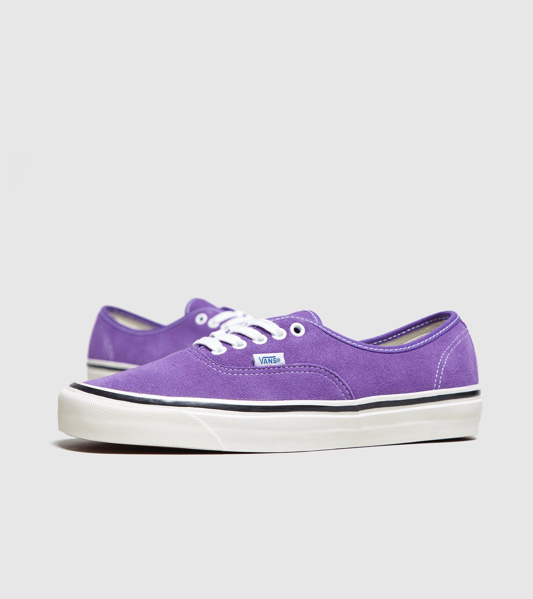 purple and turquoise vans