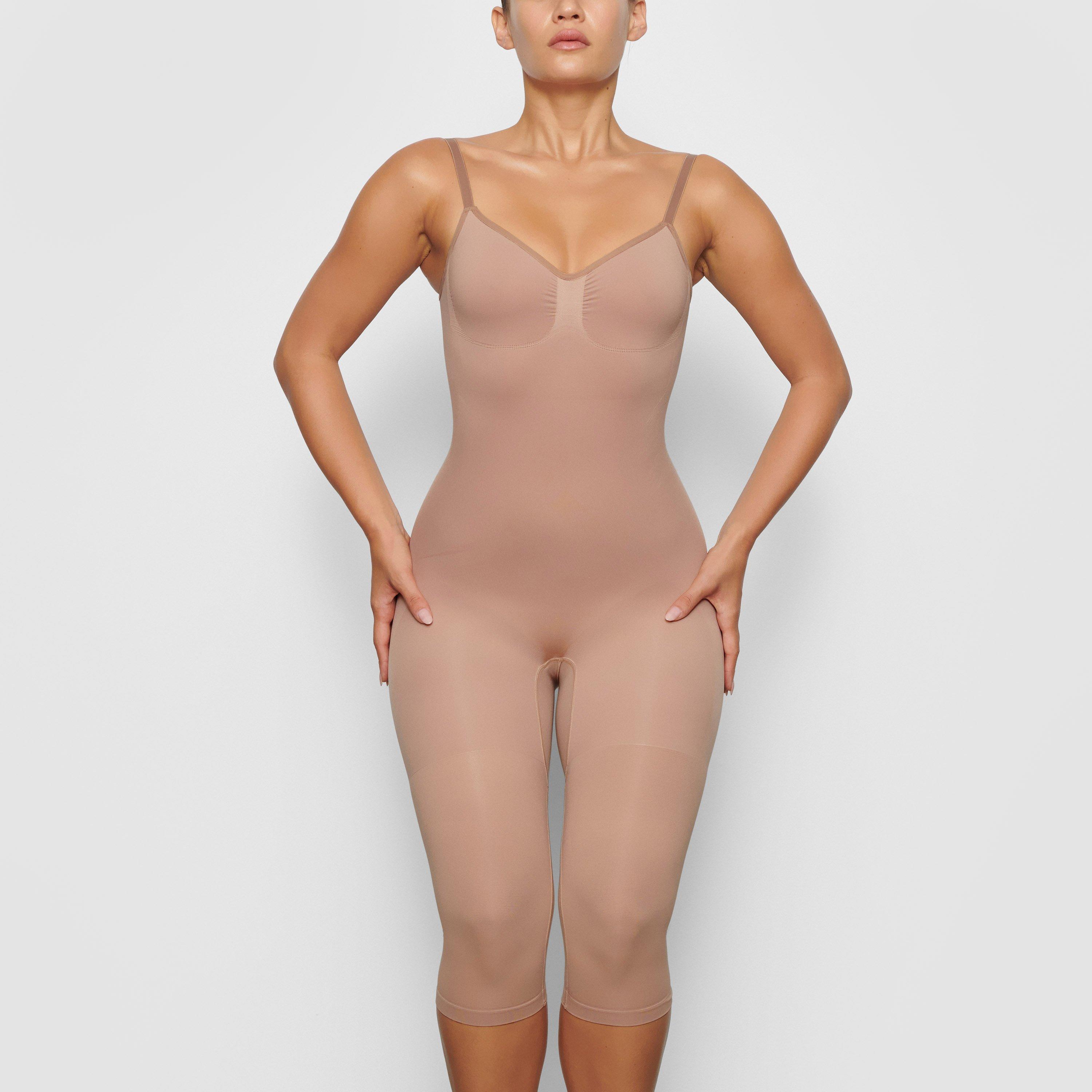Skims Seamless Sculpt Low Back Bodysuit With Hosiery Leg Lyst