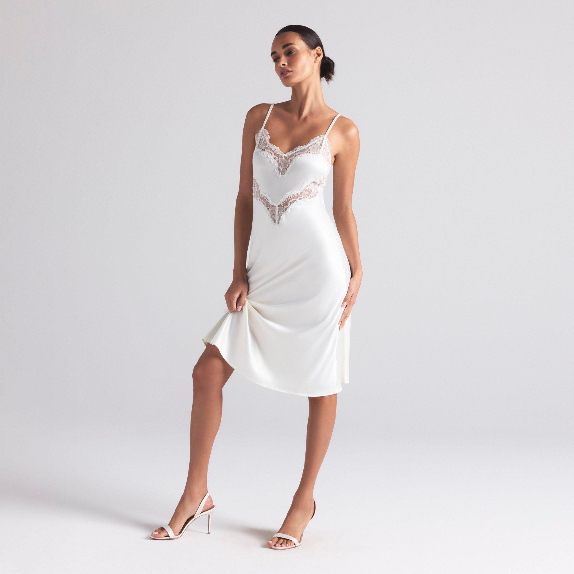 skims lace dress white SKIMS just entered its wedding era Created not only for brides, but also for bridesmaids, grooms, and the bridal party, the collection focuses on pieces that feel effortless, versatile, and aligned with