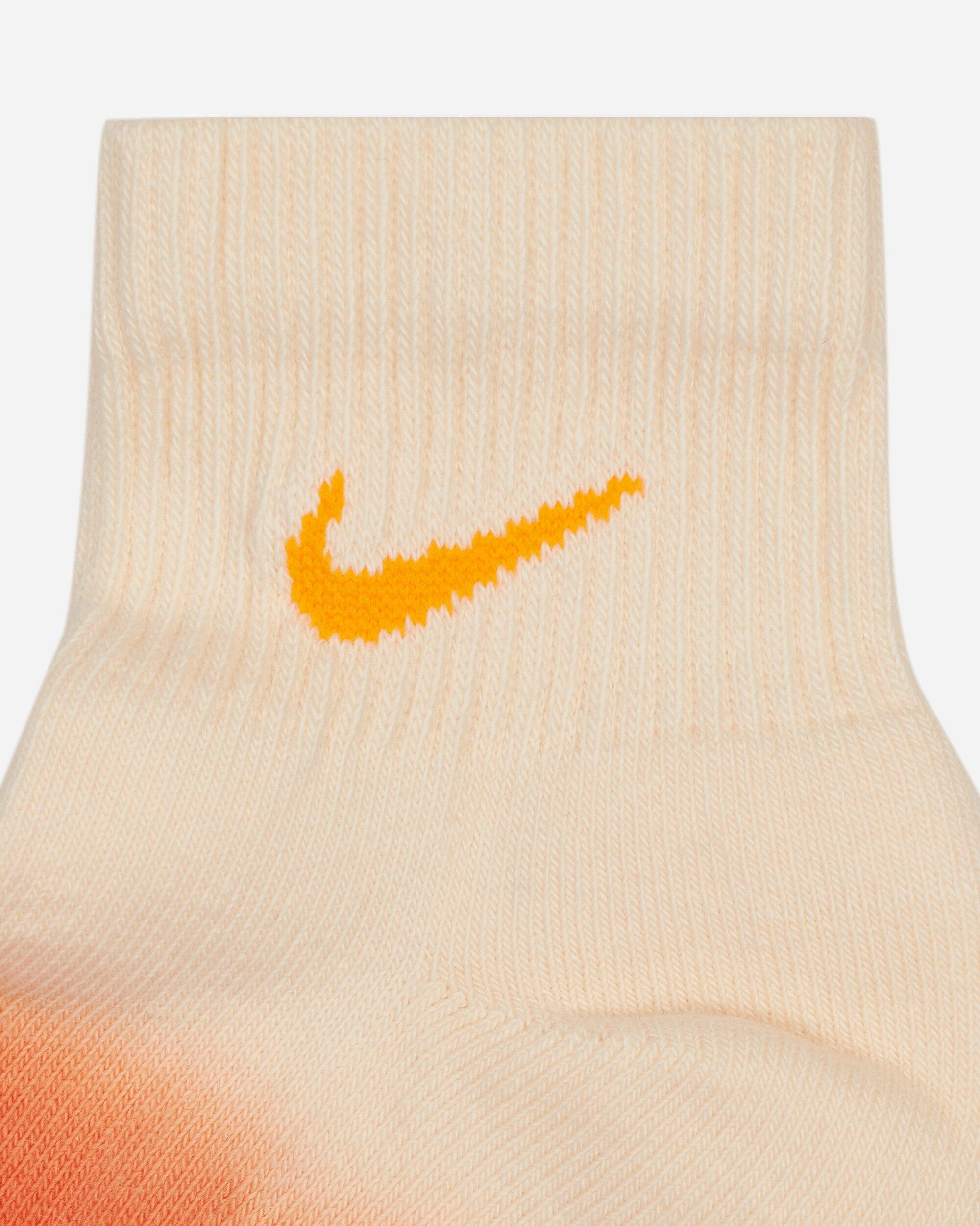 white and orange nike socks