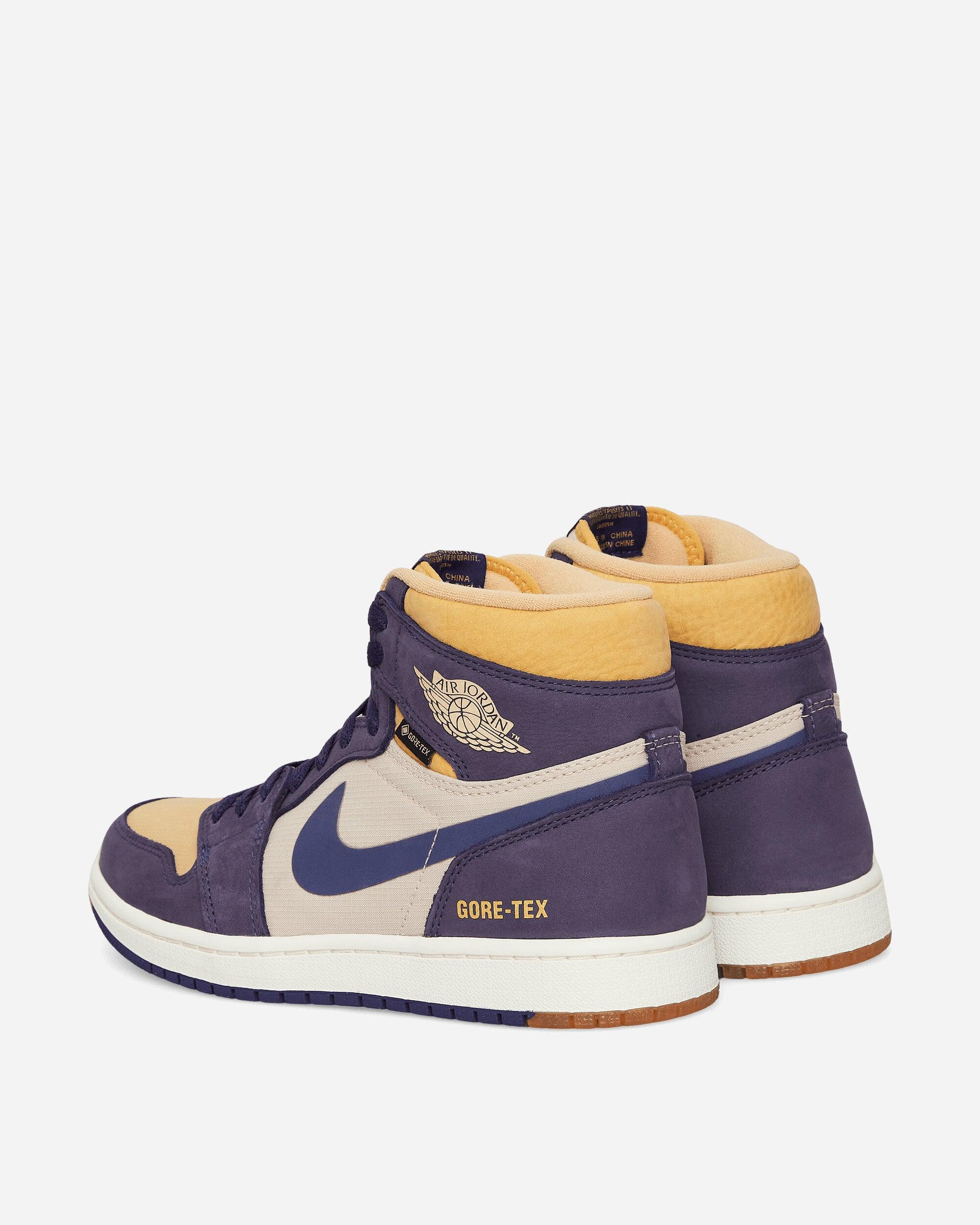 Cream and store purple jordans