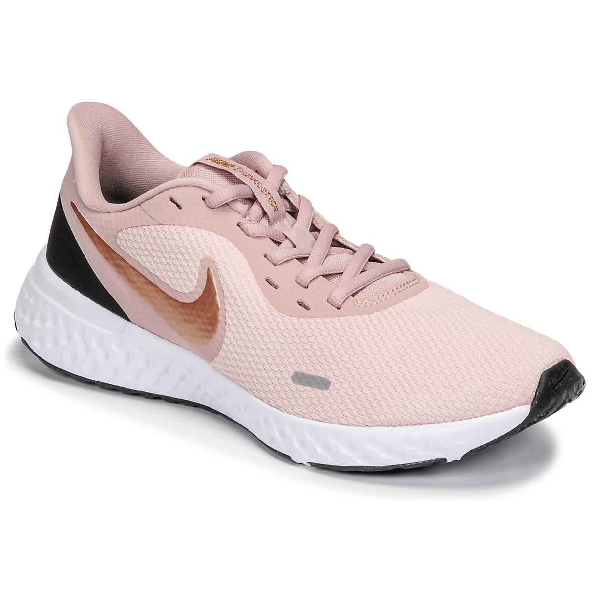 nike revolution pink trainers