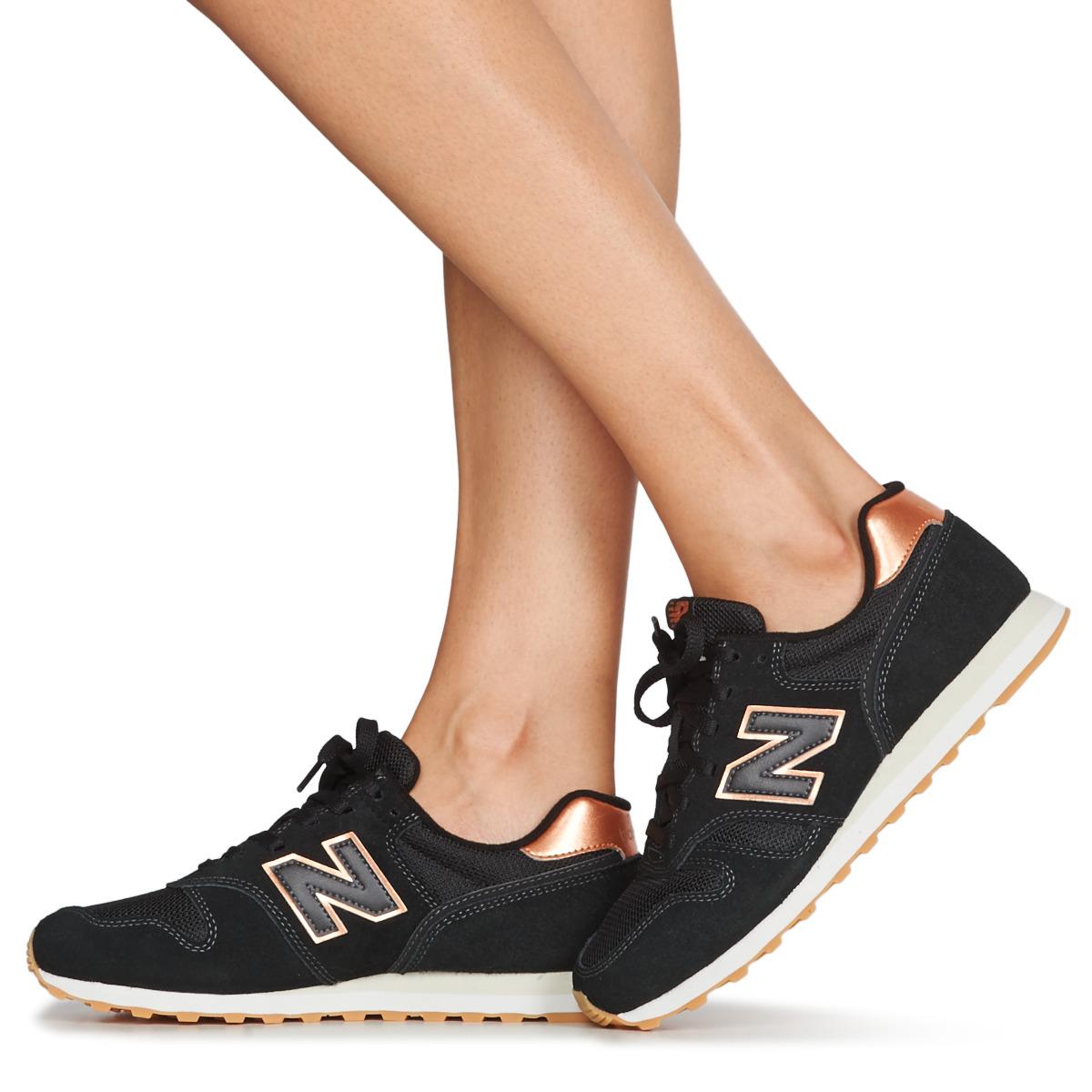 new balance black and gold trainers