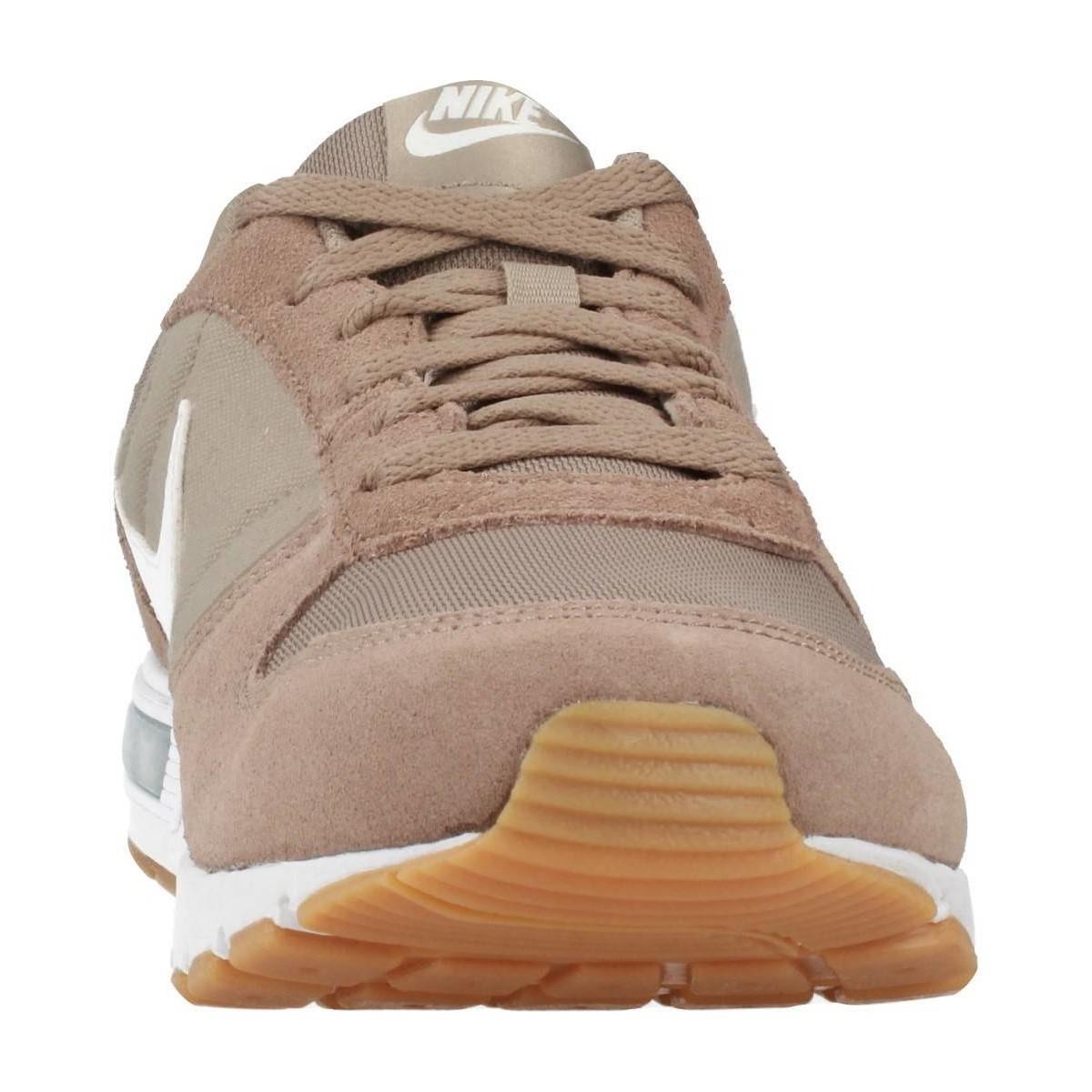 beige nike trainers mens
