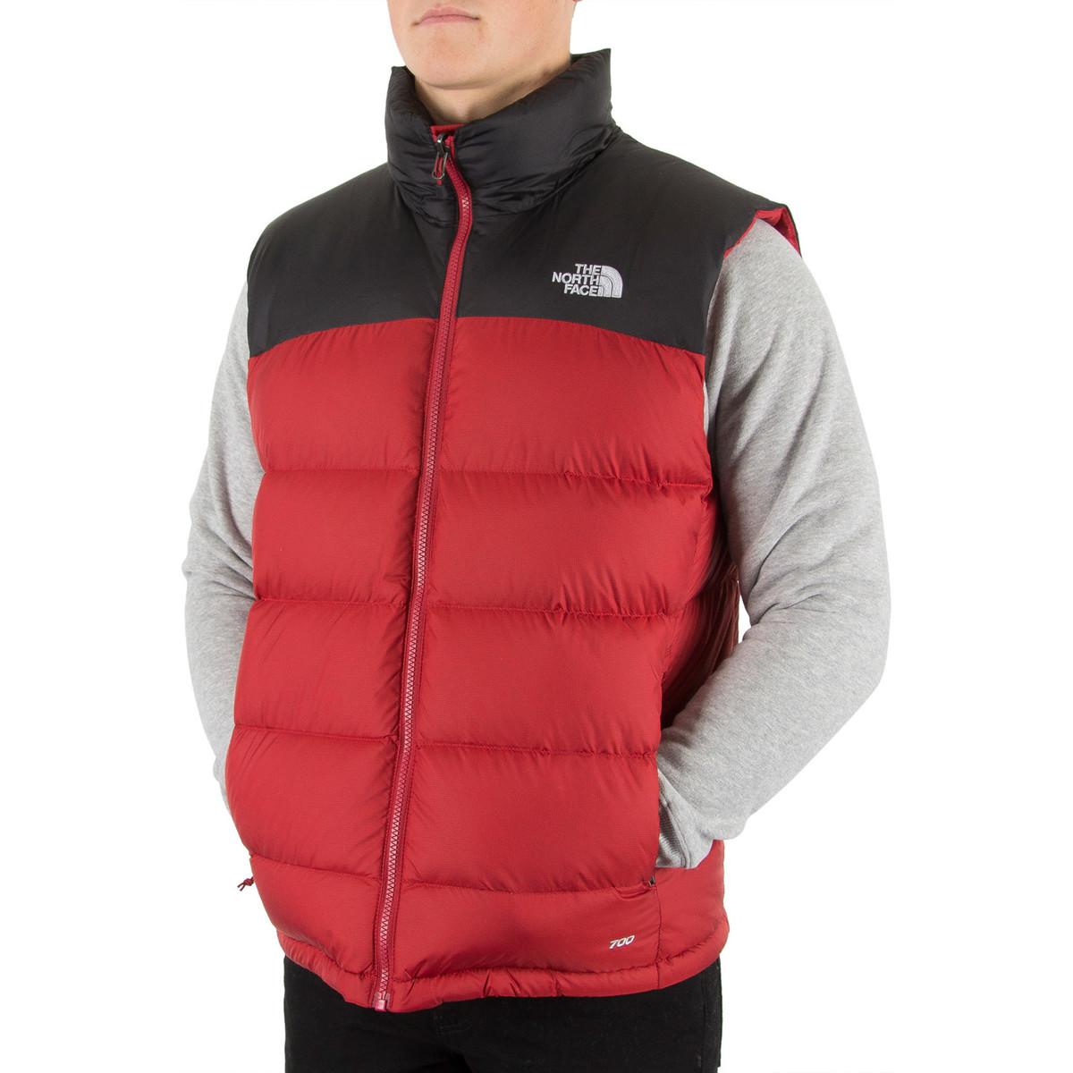 red and black north face gilet