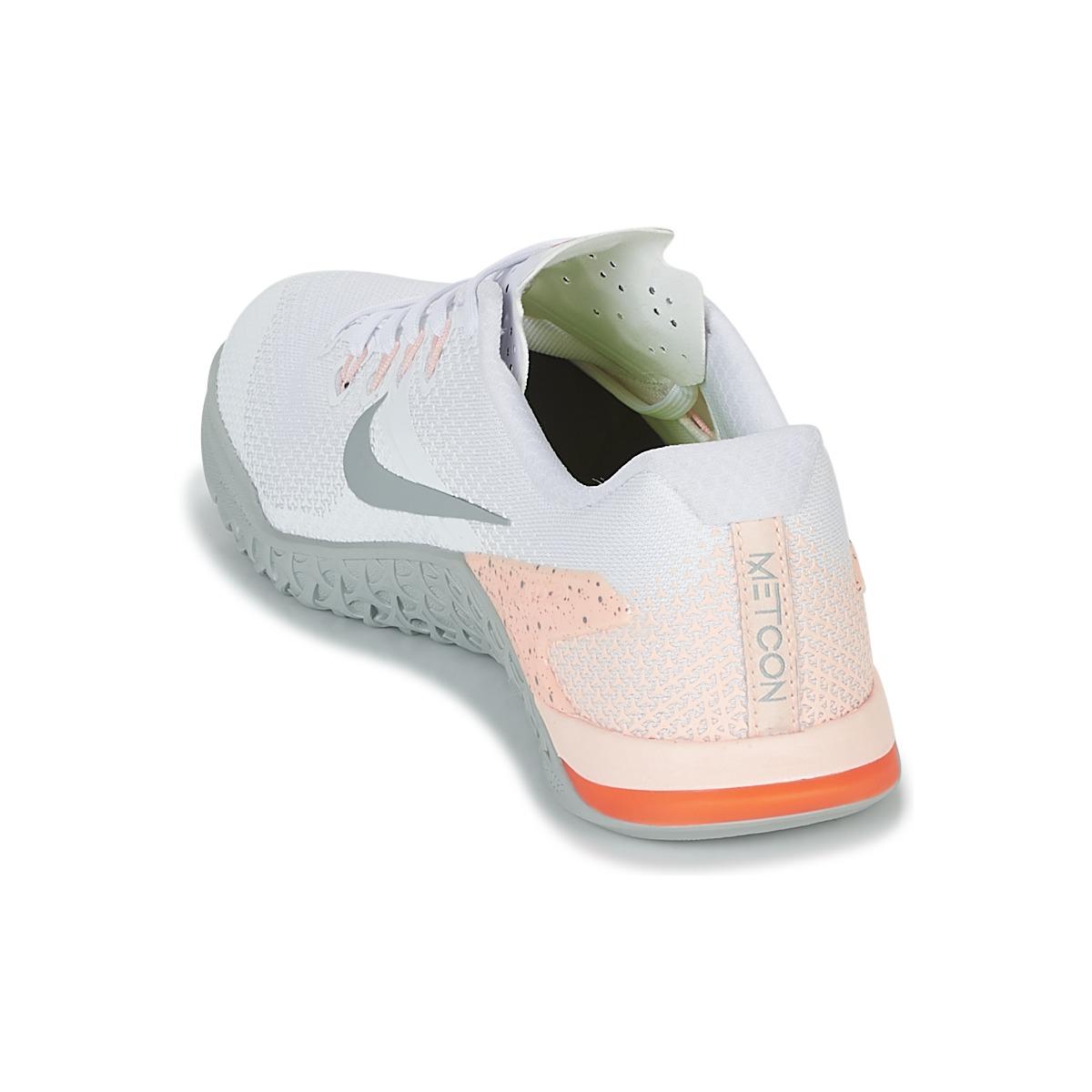 nike training metcon trainers in white and peach