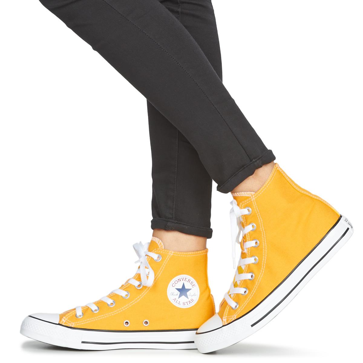 high top yellow sneakers