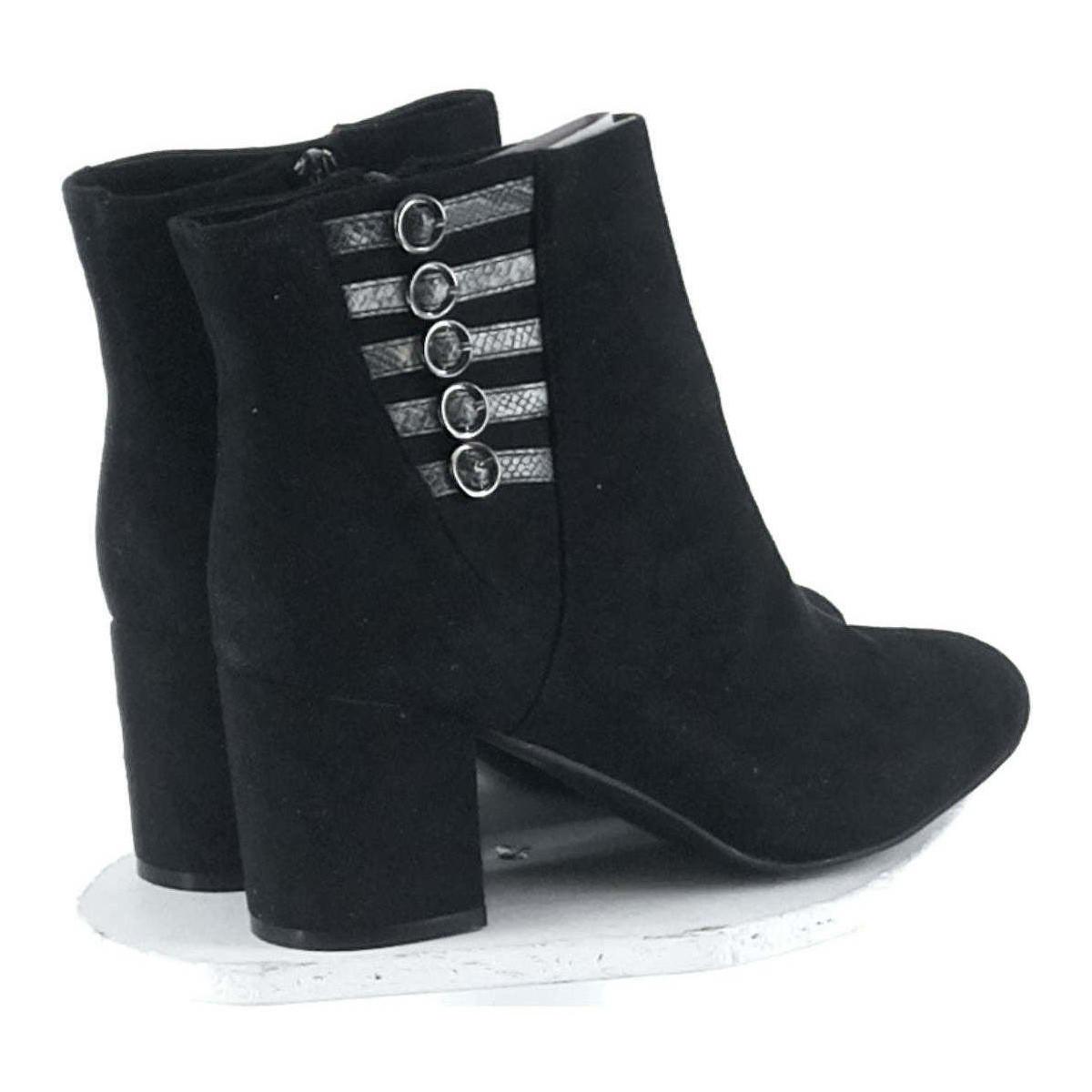 Paire De Bottes 39 Bottes Naf Naf en coloris Noir Lyst