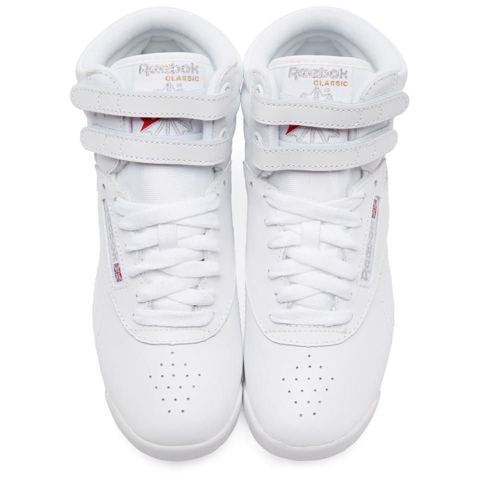 white reebok freestyle high tops