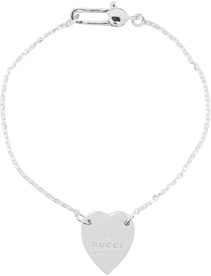 heart bracelet with gucci trademark