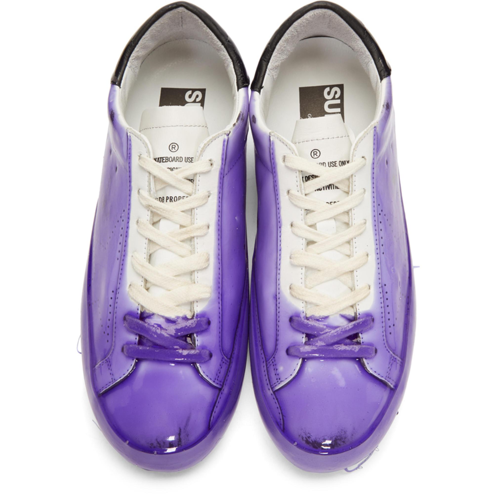 golden goose taped sneakers